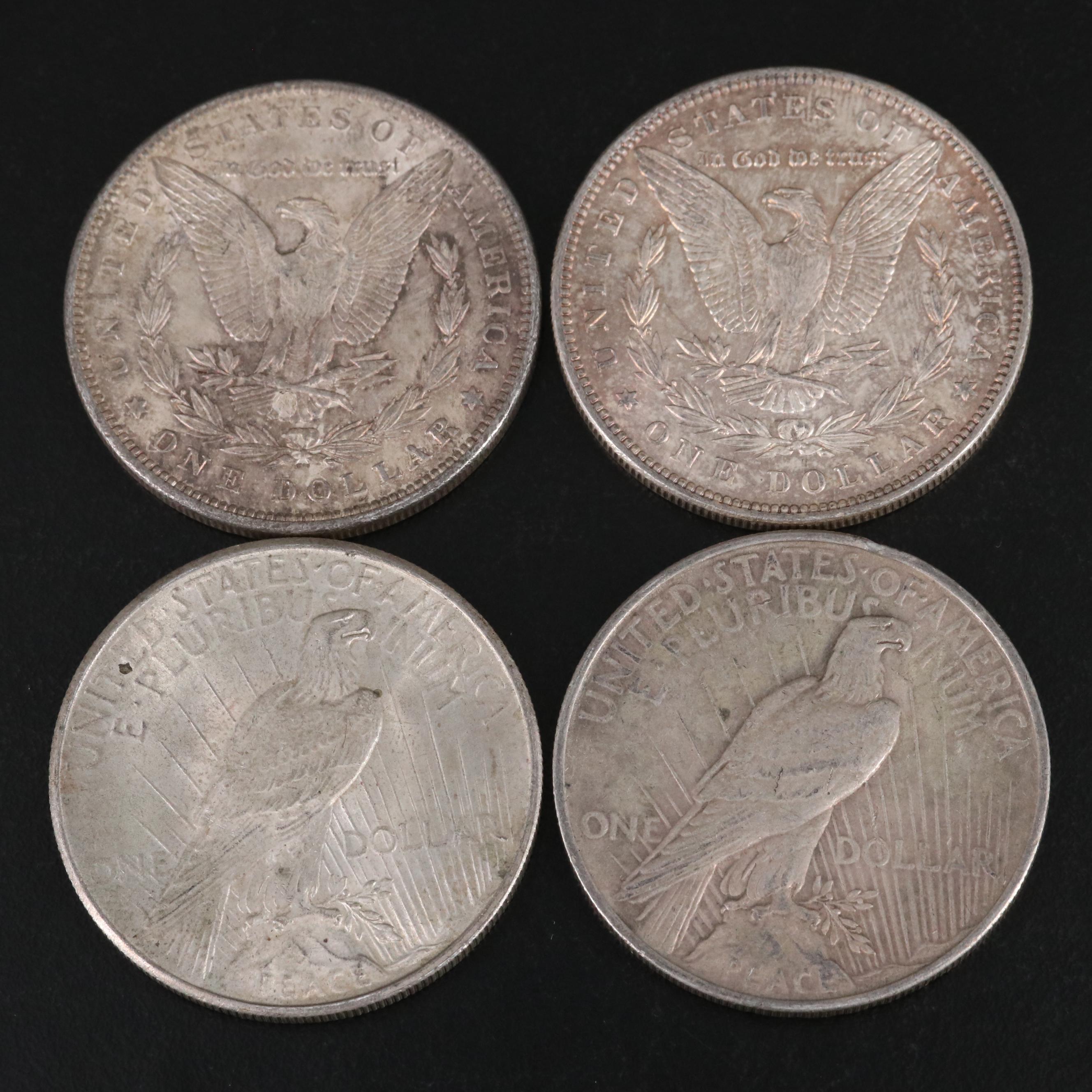 Nineteen Morgan and Peace Silver Dollars