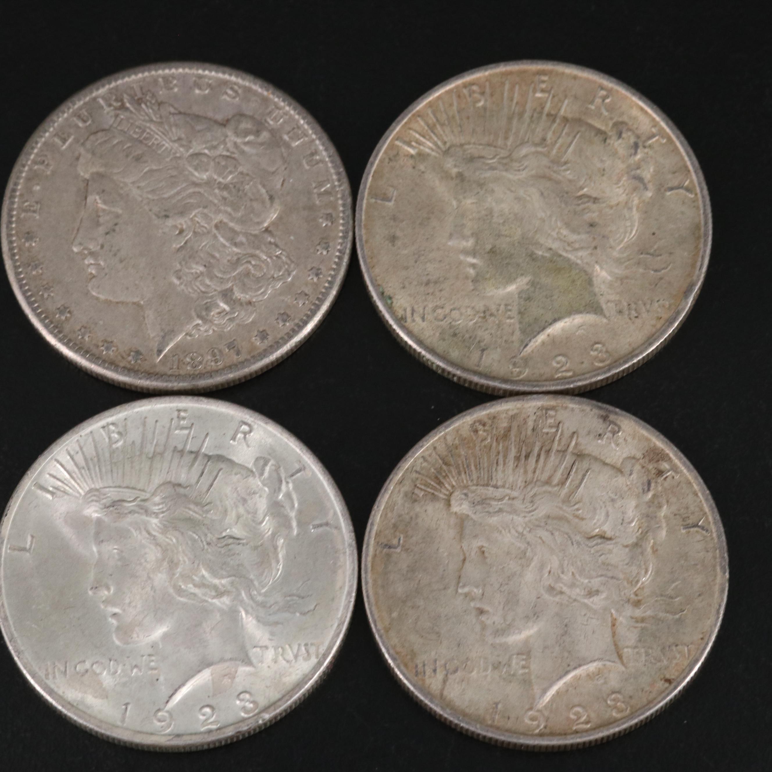 Nineteen Morgan and Peace Silver Dollars