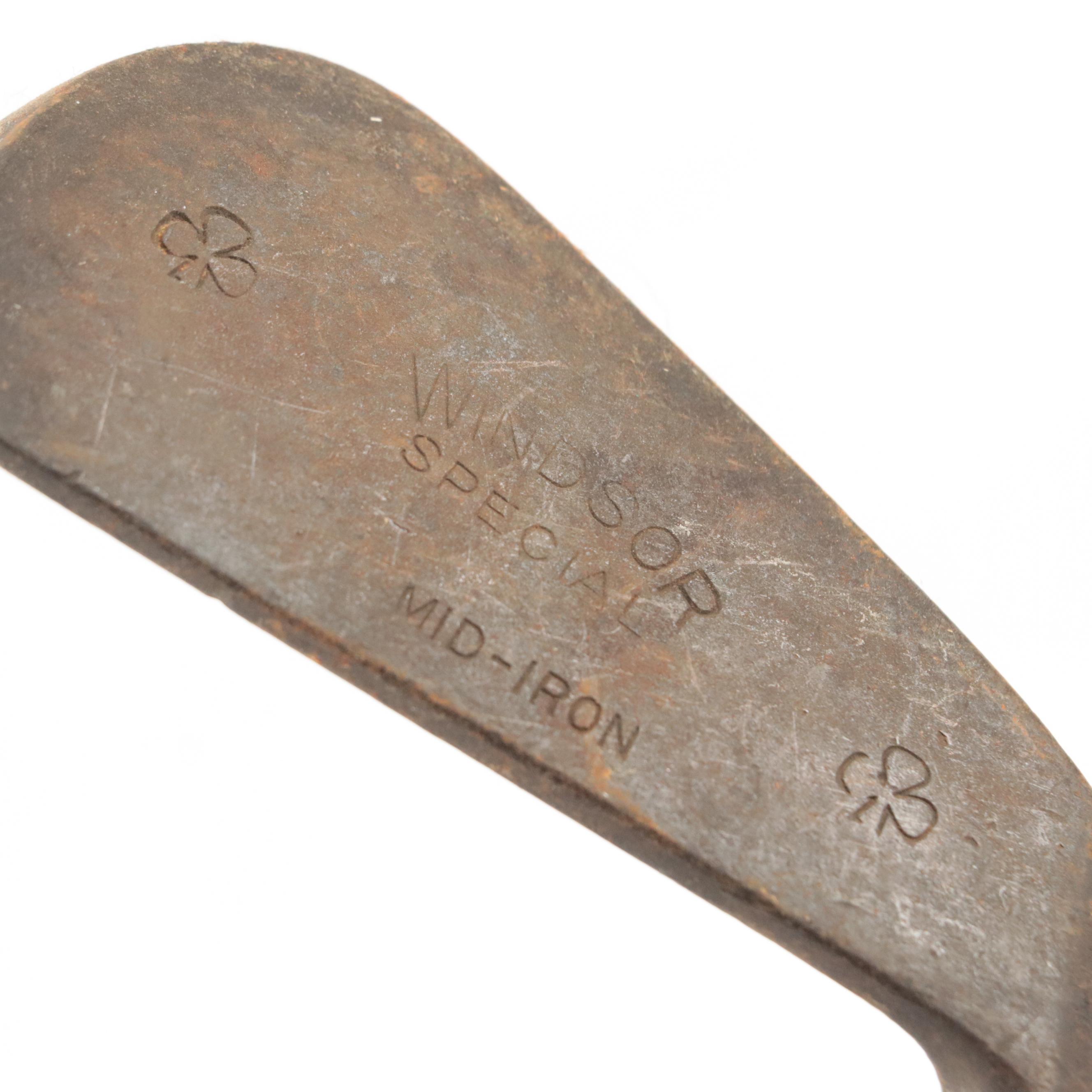 Seven Leather-Wrapped Hickory Shaft Golf Clubs, Including Spalding "Kro-Flite"