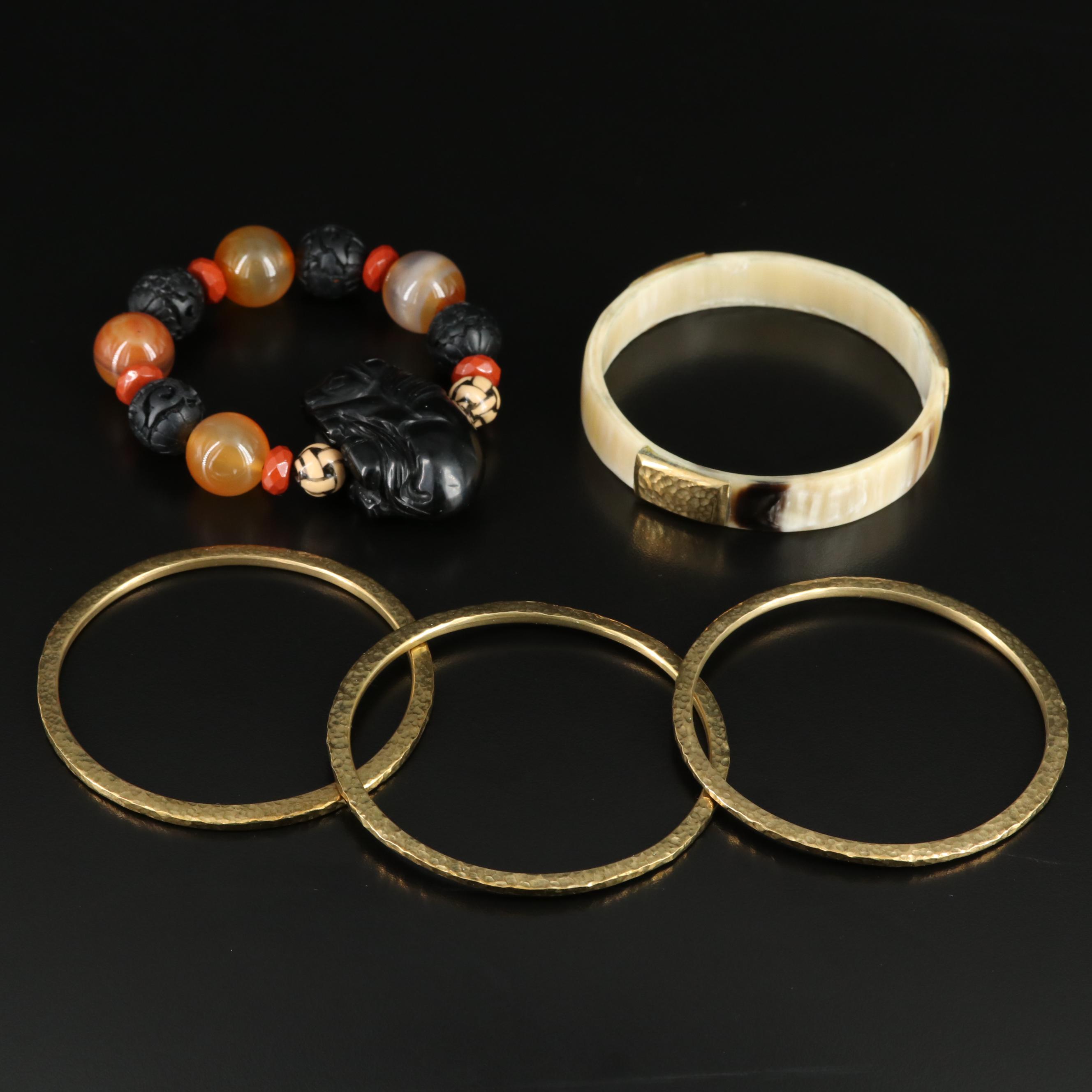 Horn, Agate and Red Jasper Featured in Bracelet Collection
