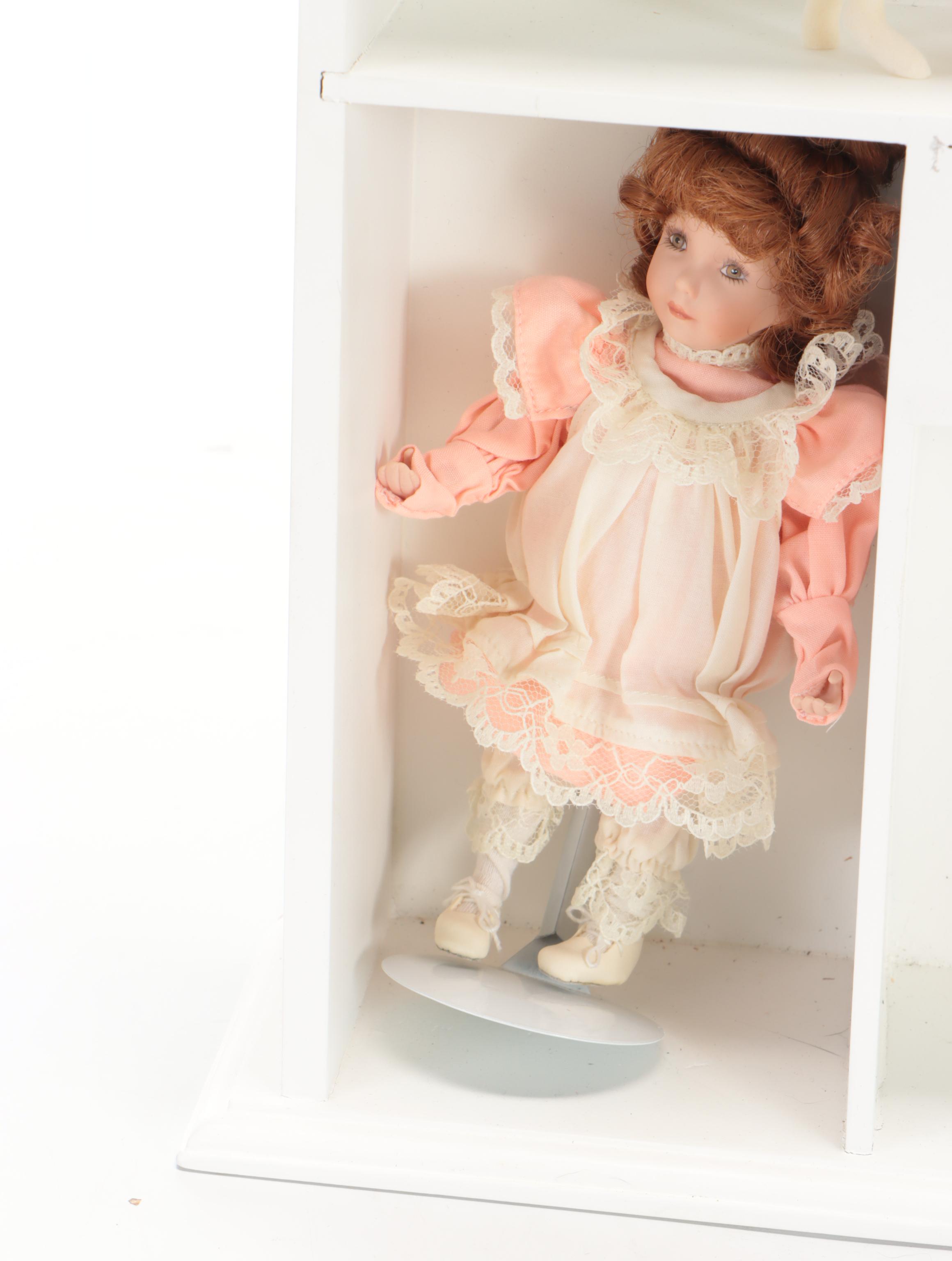 The Ashton- Drake Miniature Collection Dolls