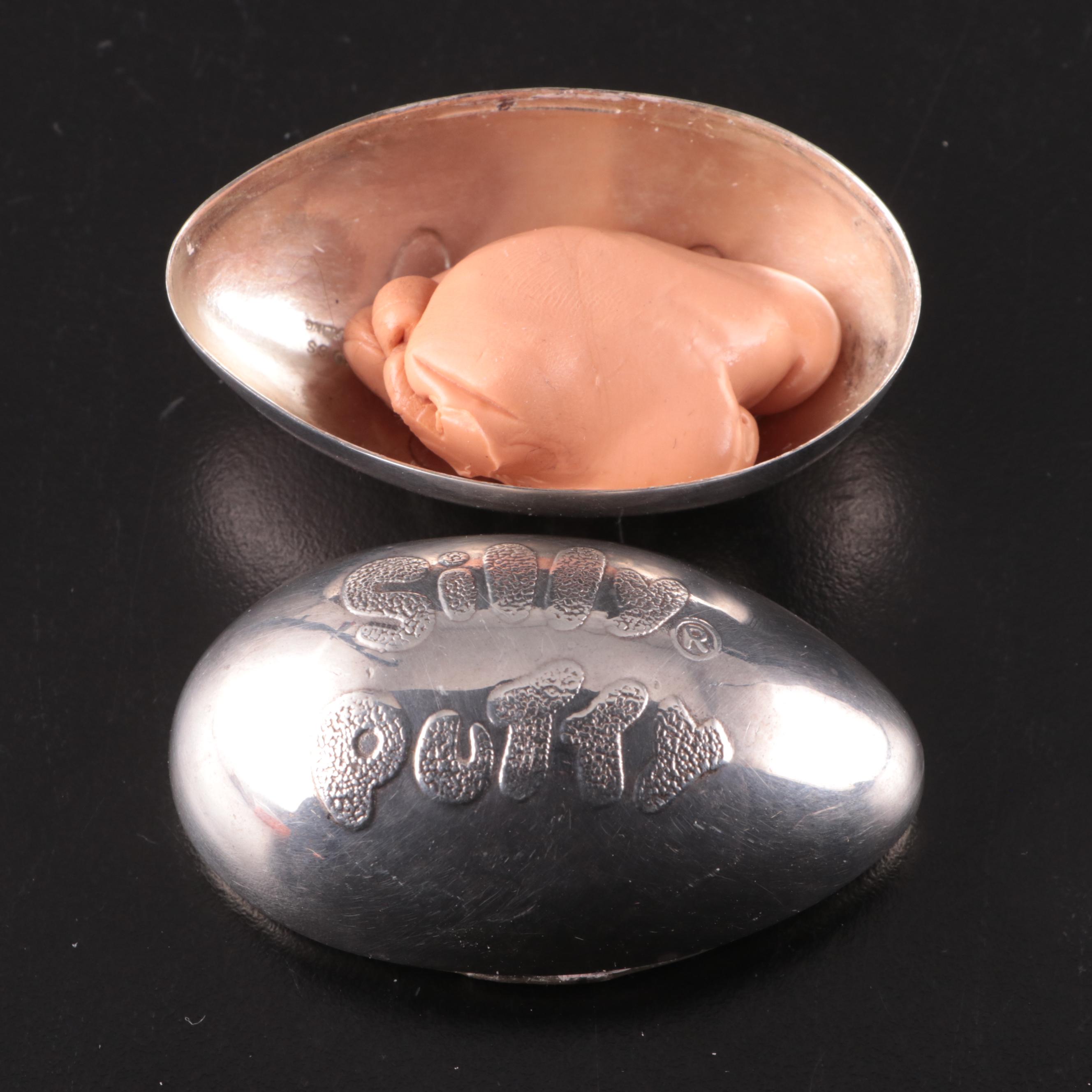 Niemann Marcus Sterling Silver Silly Putty Eggs