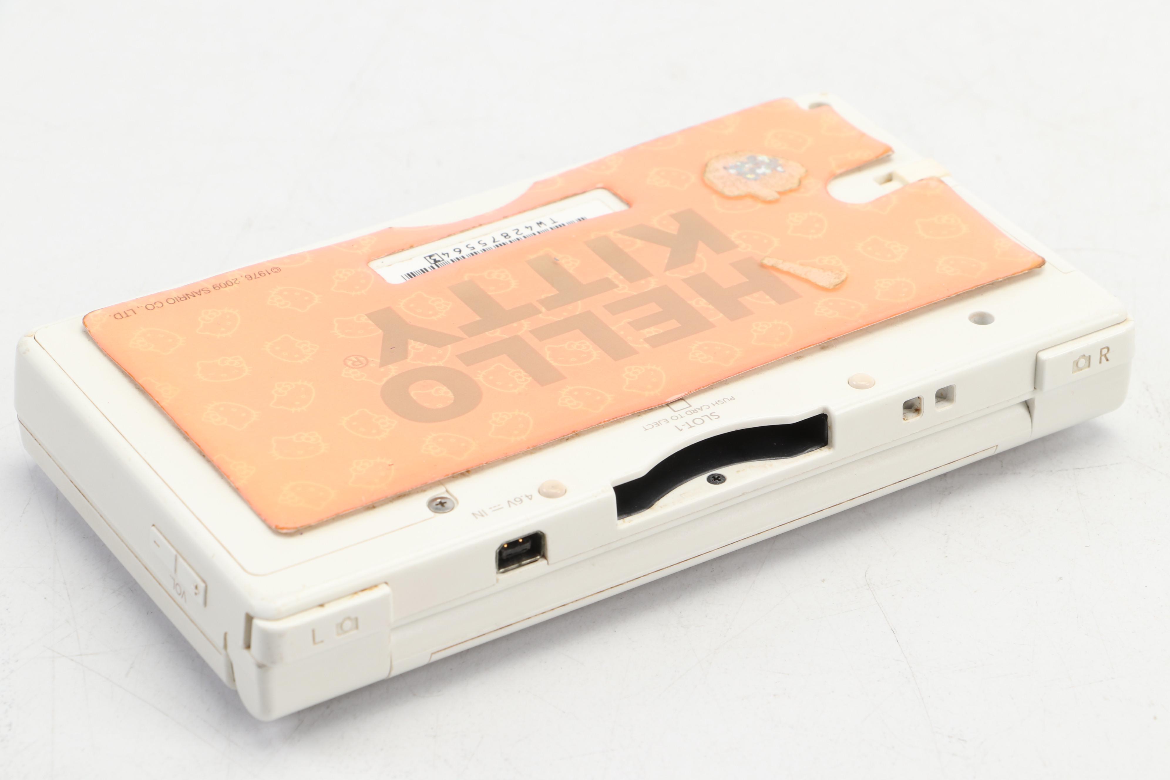 Nintendo DS Game Console with Sony Stereo Earbuds and More