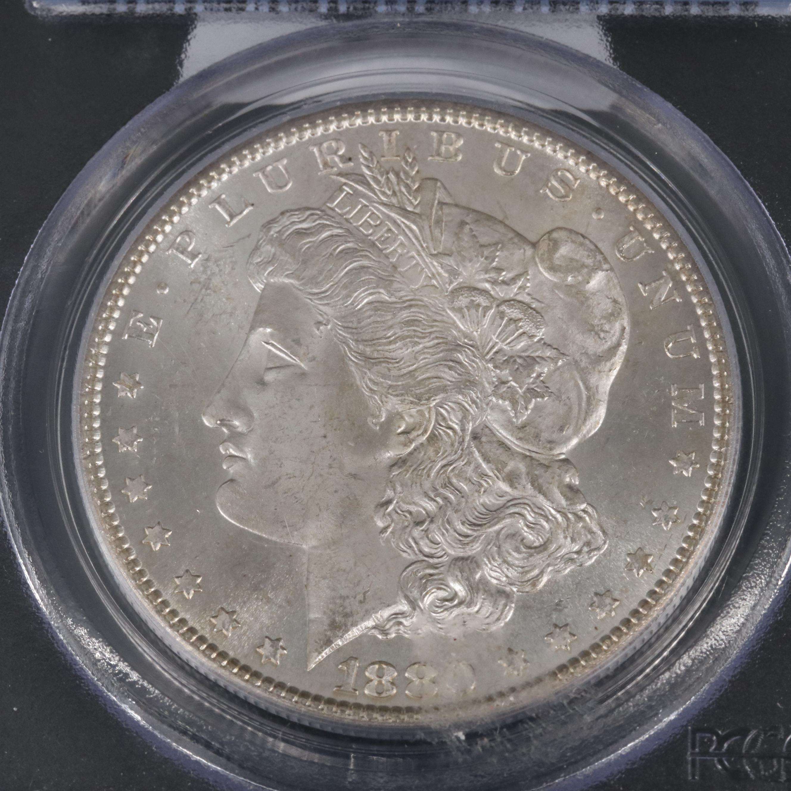 Group of Two PCGS Graded Morgan Silver Dollars Including an MS64 1880-S