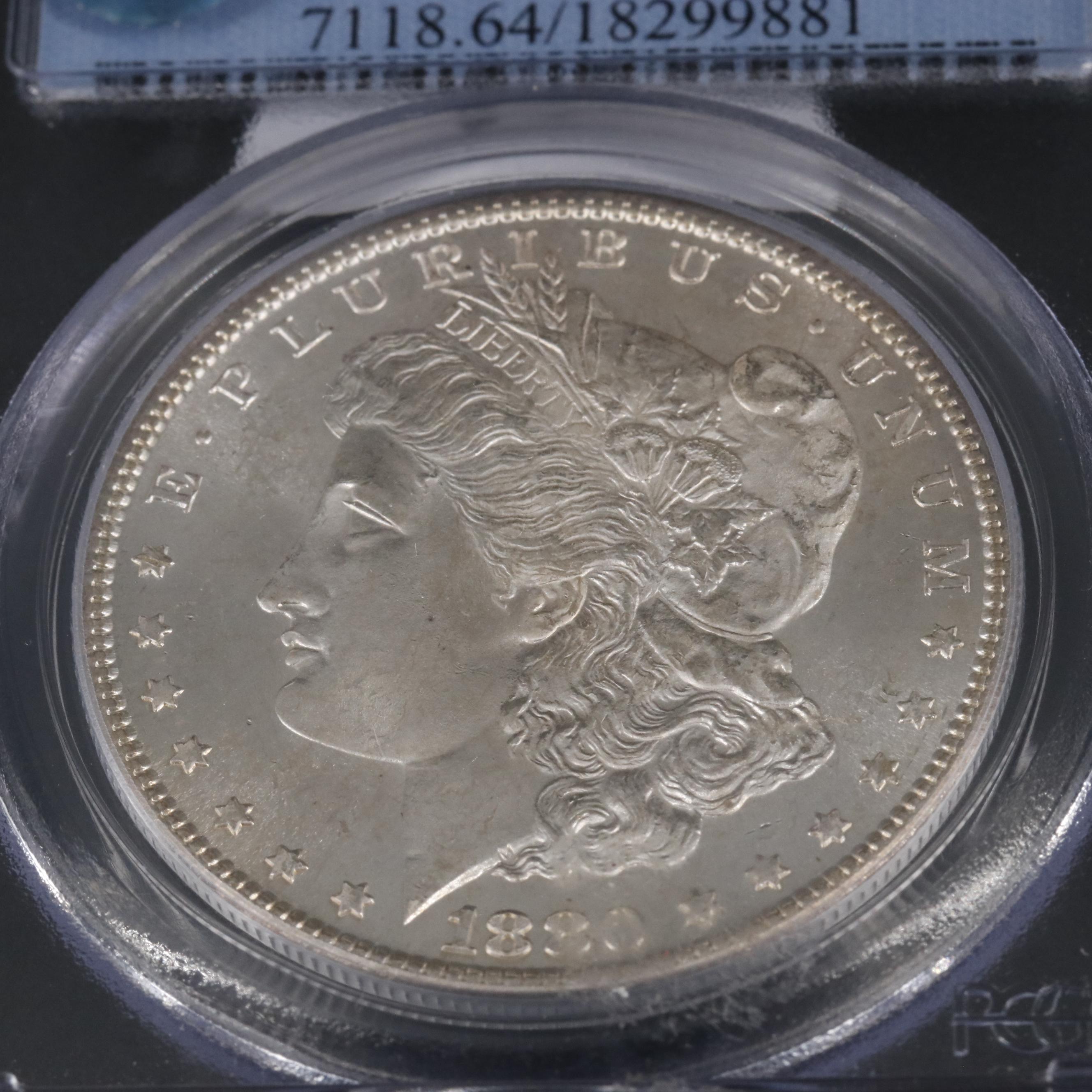 Group of Two PCGS Graded Morgan Silver Dollars Including an MS64 1880-S
