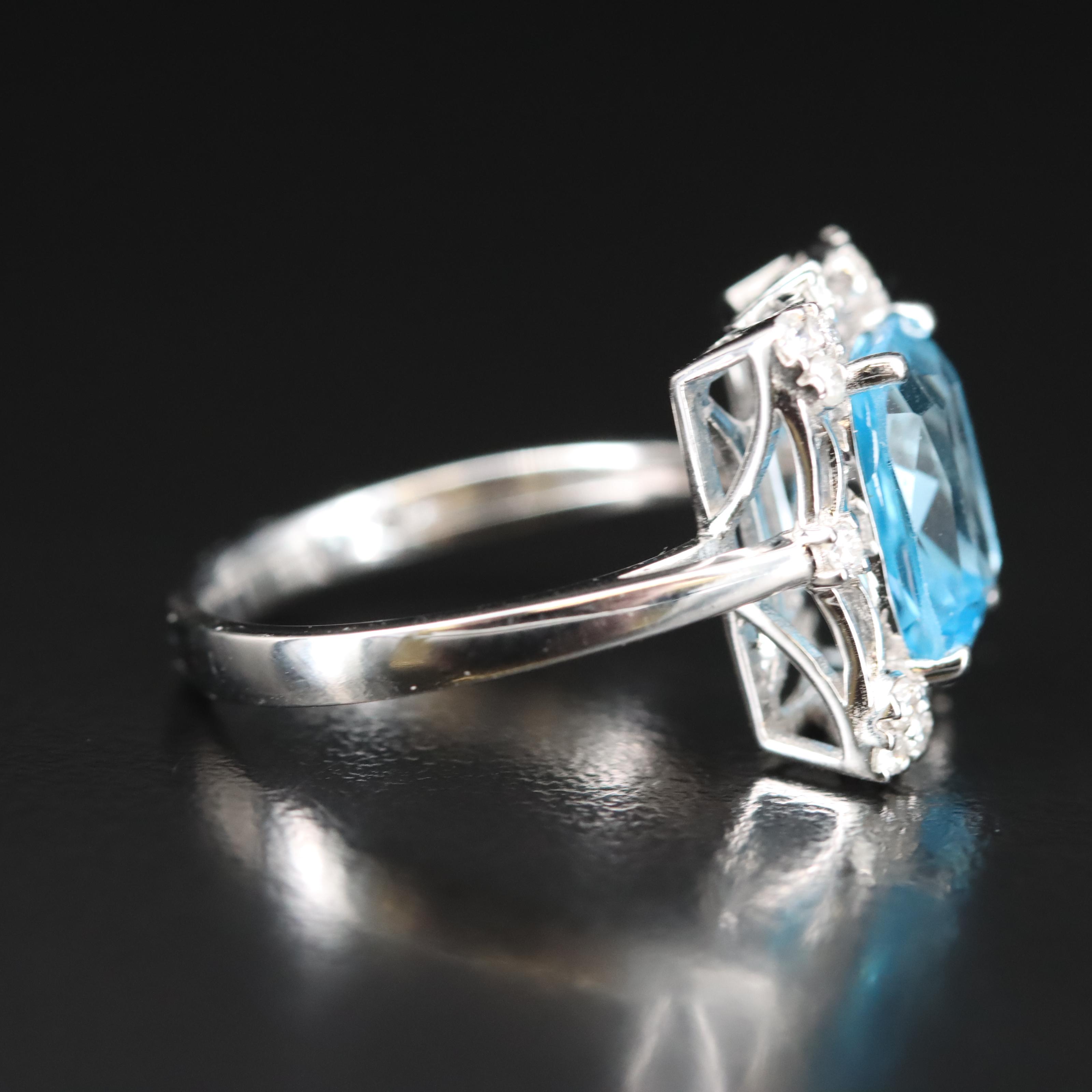 14K Swiss Blue Topaz and Diamond Ring