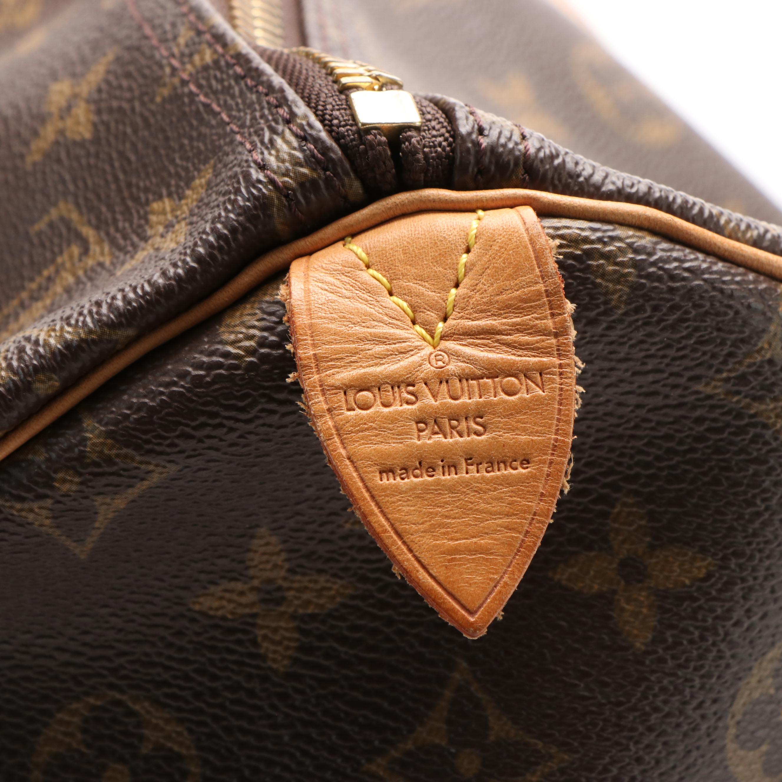 Louis Vuitton Keepall 55 in Brown Monogram Coated Canvas with Leather Trim