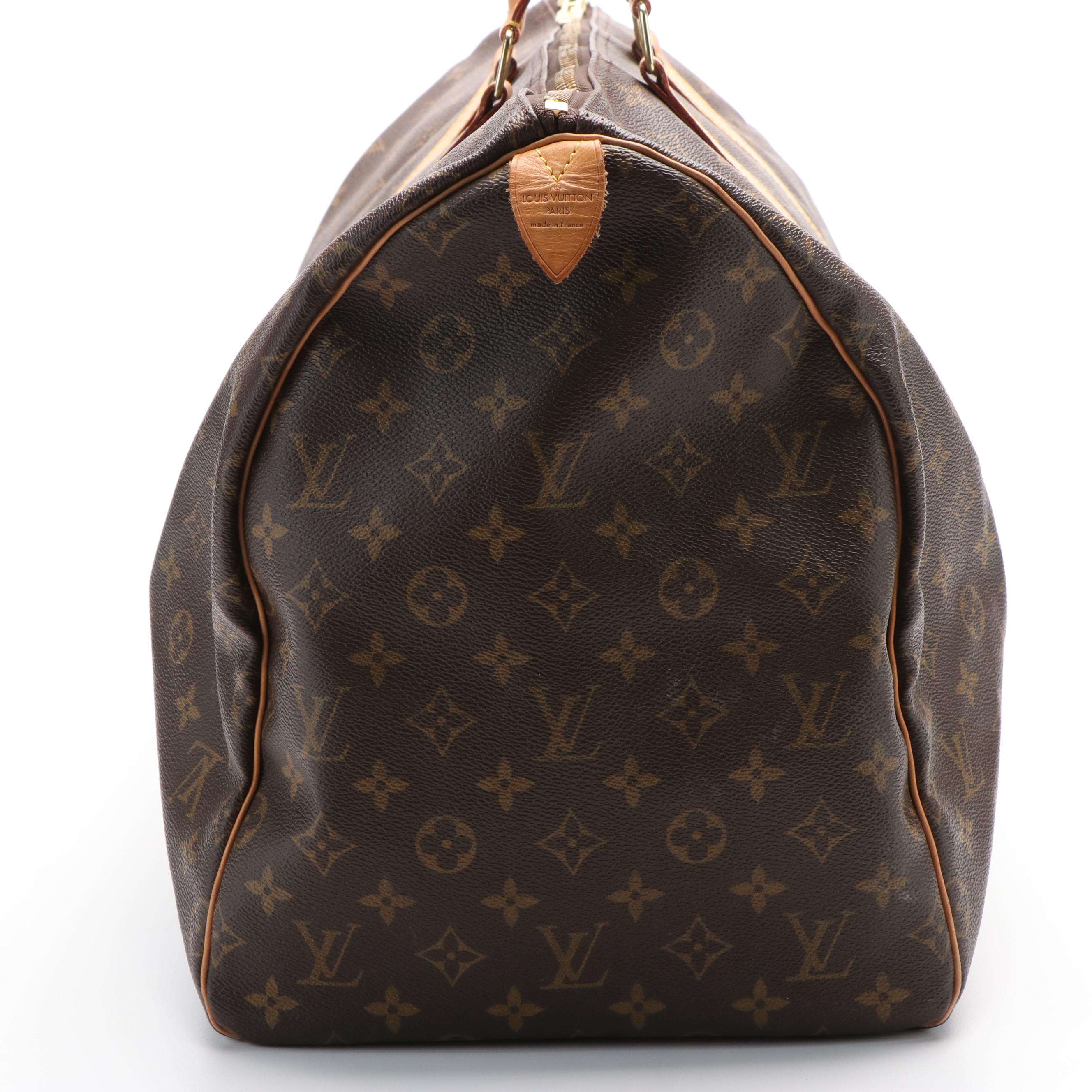 Louis Vuitton Keepall 55 in Brown Monogram Coated Canvas with Leather Trim