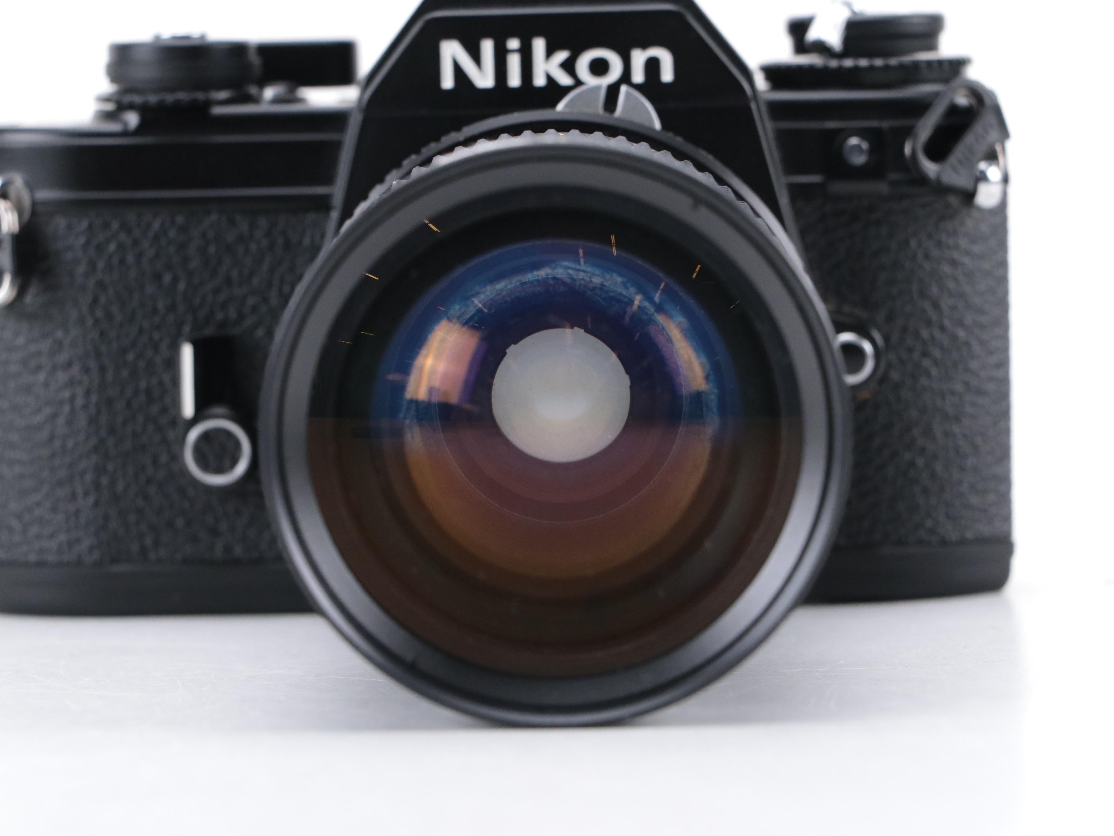 Nikon EM 35mm Camera with 135 and 205mm Lenses