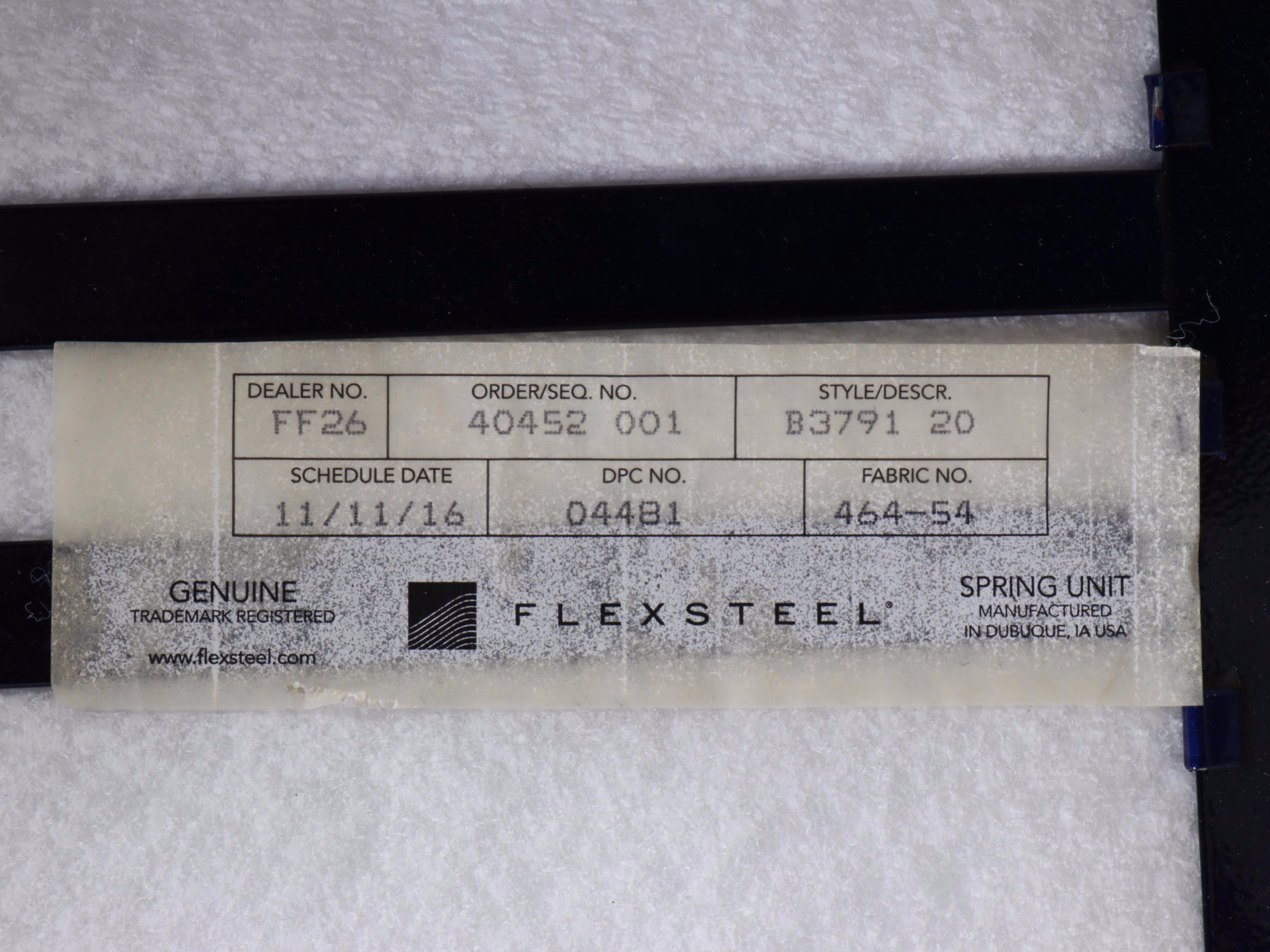 Flexsteel Leather-Upholstered and Brass-Tacked Loveseat