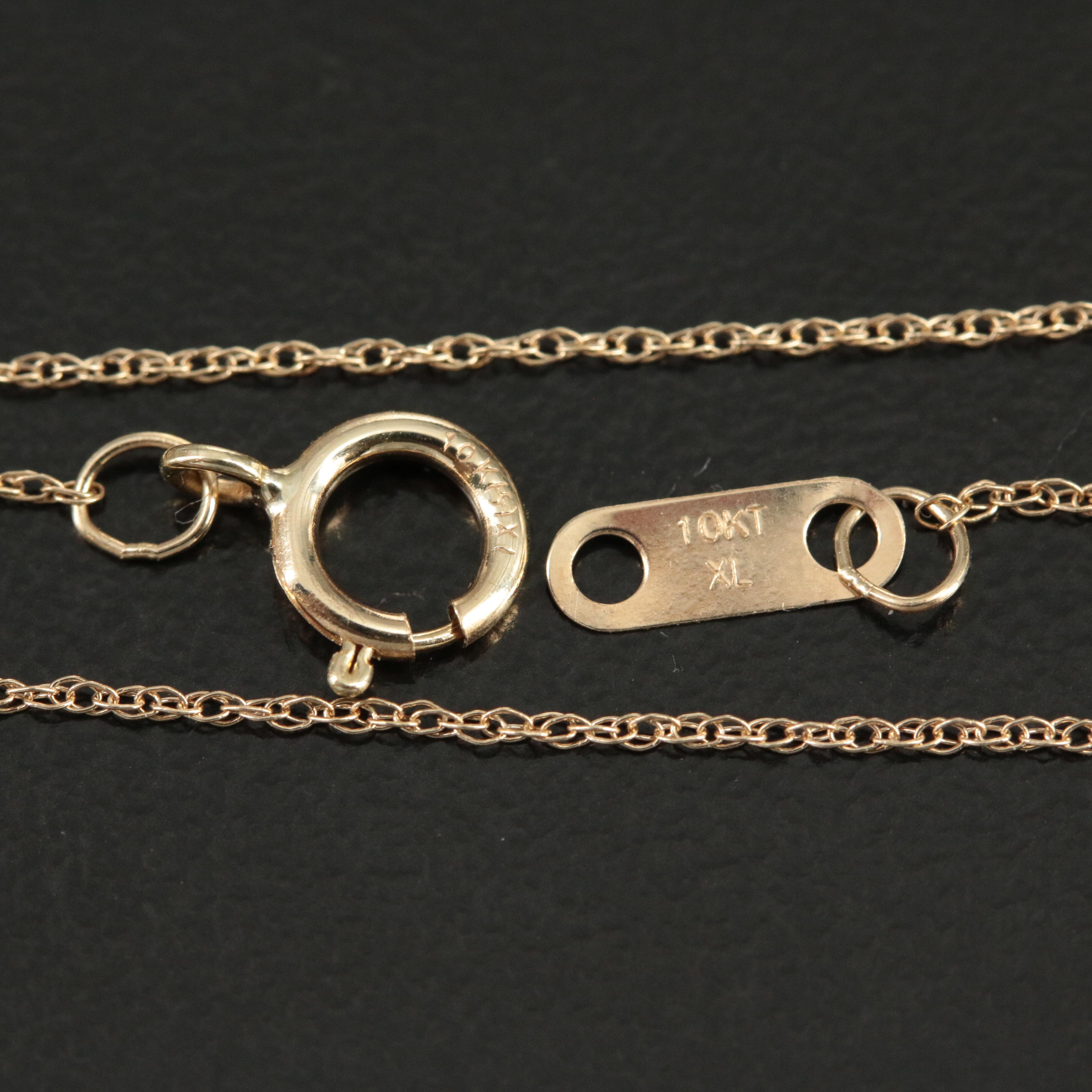 10K Ruby and Diamond Open Heart Necklace