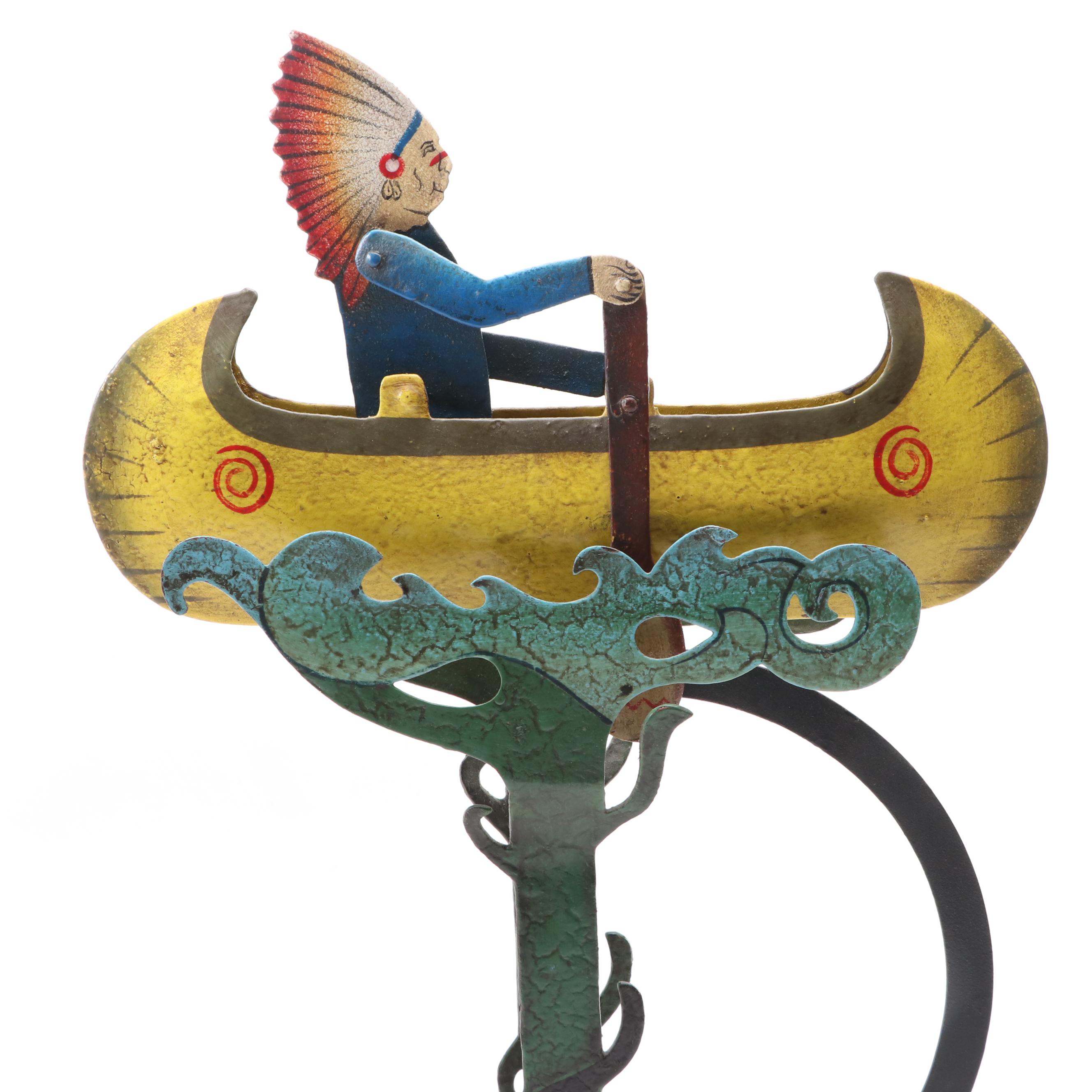 Folk Art Style Metal Native American in Canoe Kinetic Pendulum Sculpture