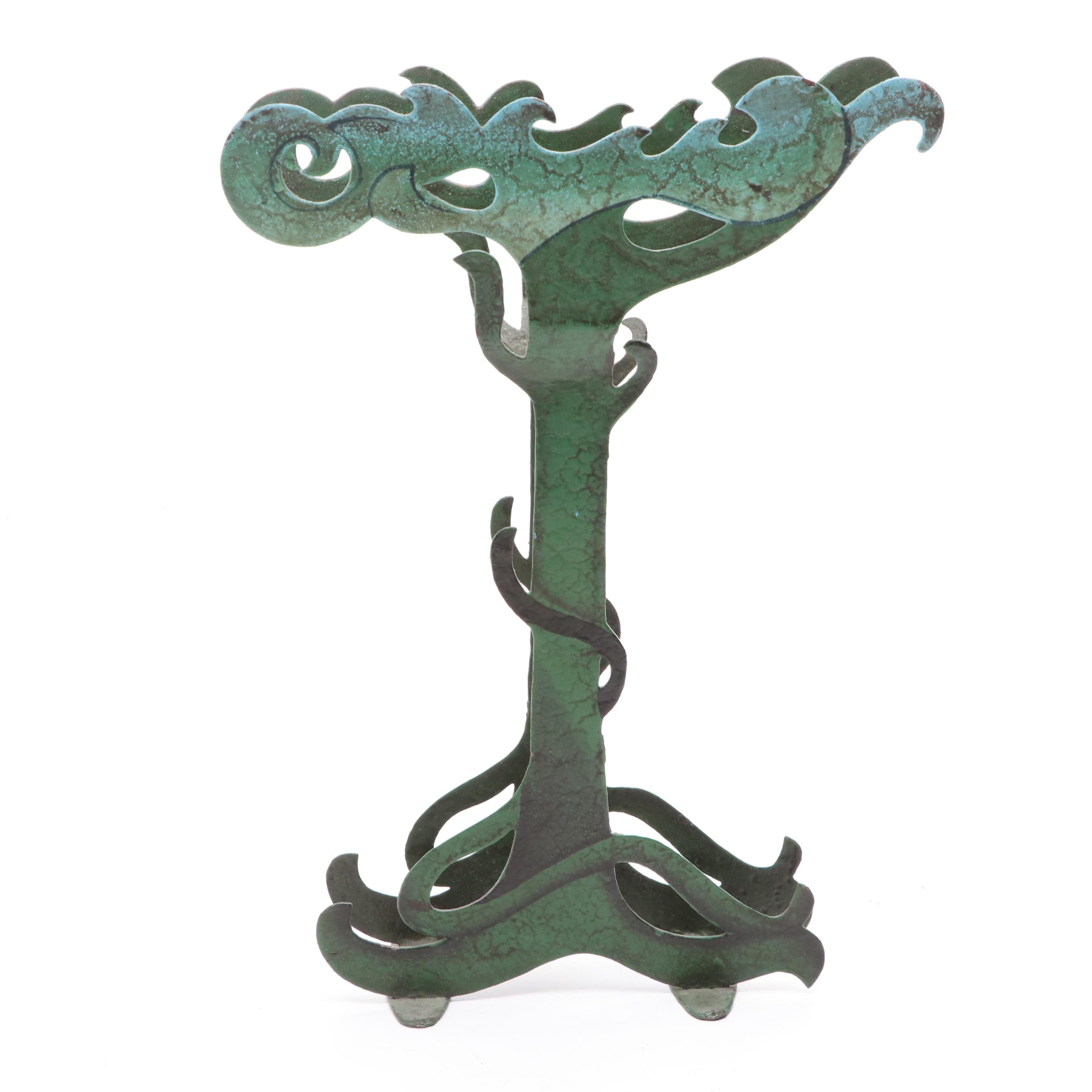 Folk Art Style Metal Native American in Canoe Kinetic Pendulum Sculpture