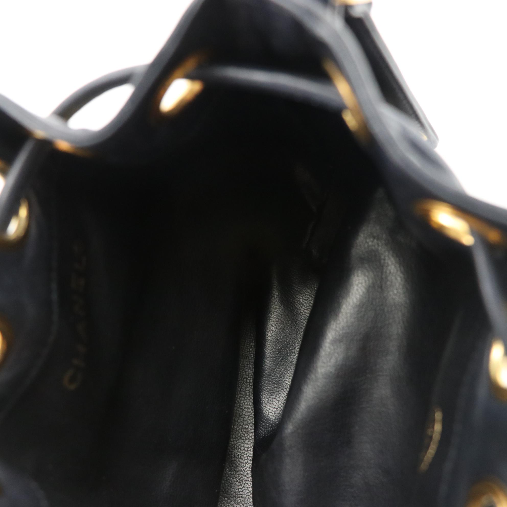 Chanel CC Mini Drawstring Bucket Bag in Navy Lambskin Leather with Zip Pouch