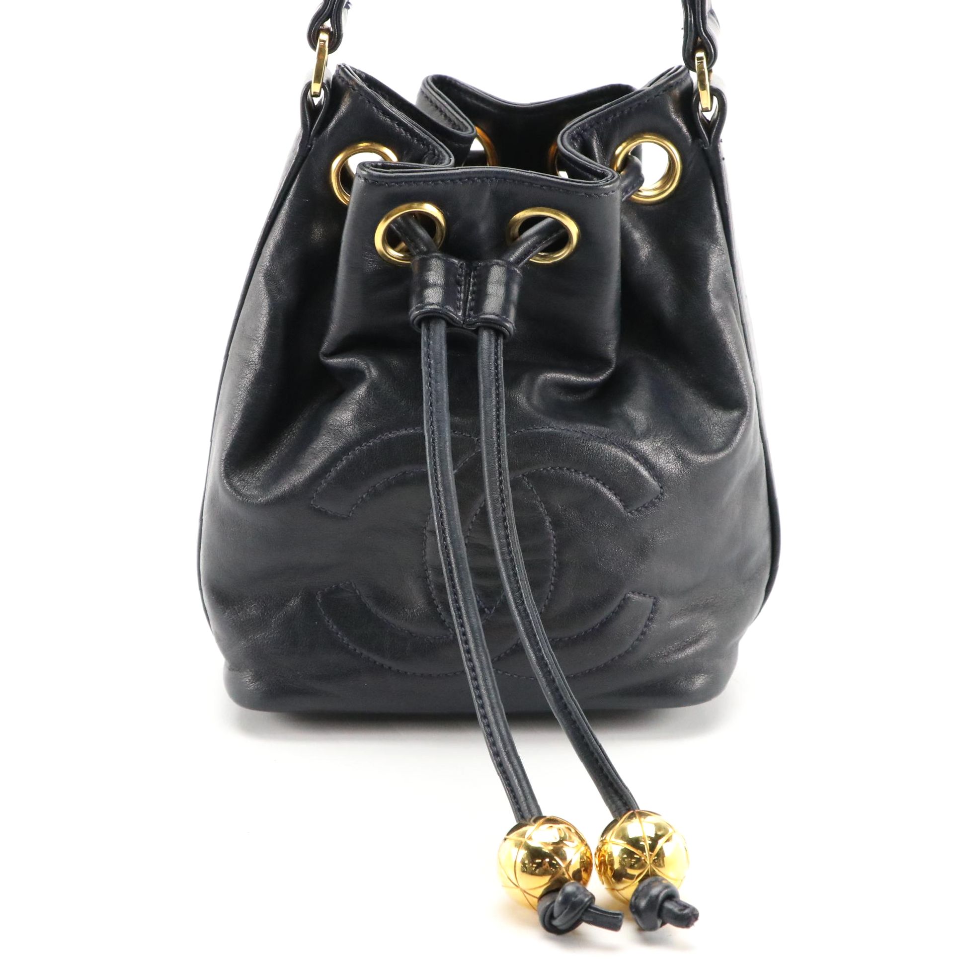 Chanel CC Mini Drawstring Bucket Bag in Navy Lambskin Leather with Zip Pouch