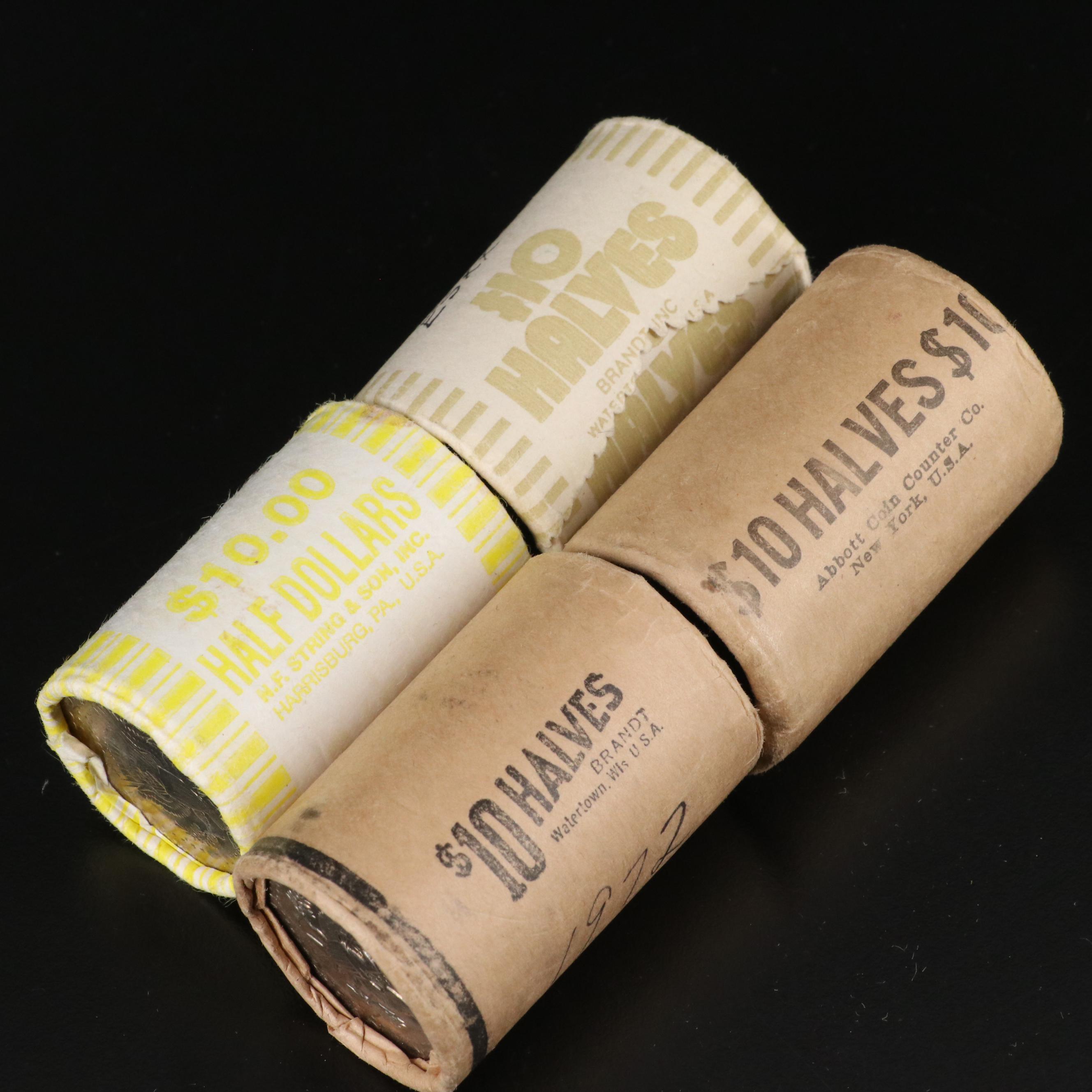 Four Uncirculated Rolls of Kennedy Half Dollars