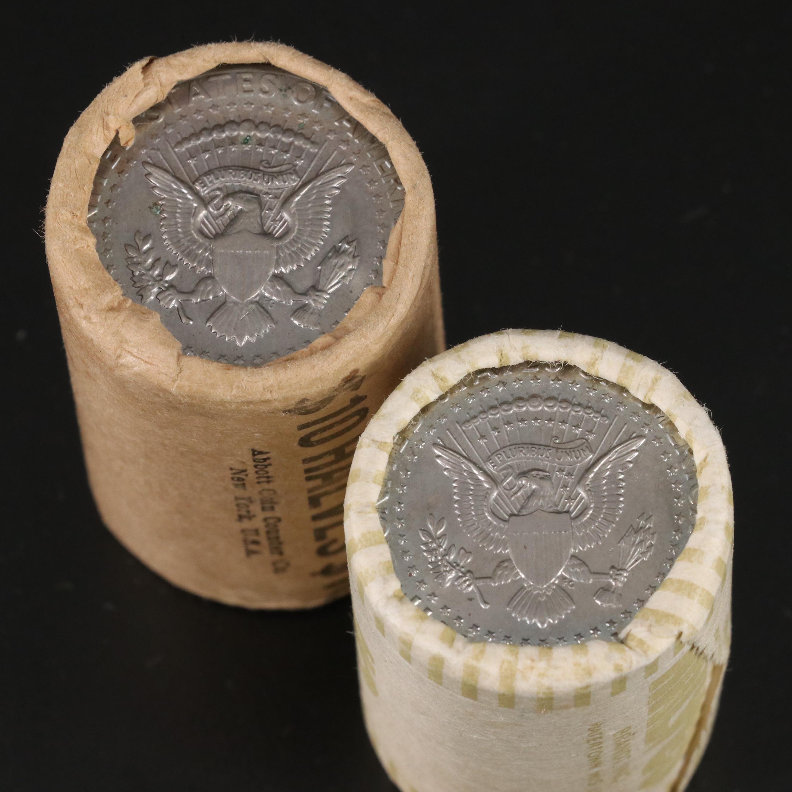 Four Uncirculated Rolls of Kennedy Half Dollars