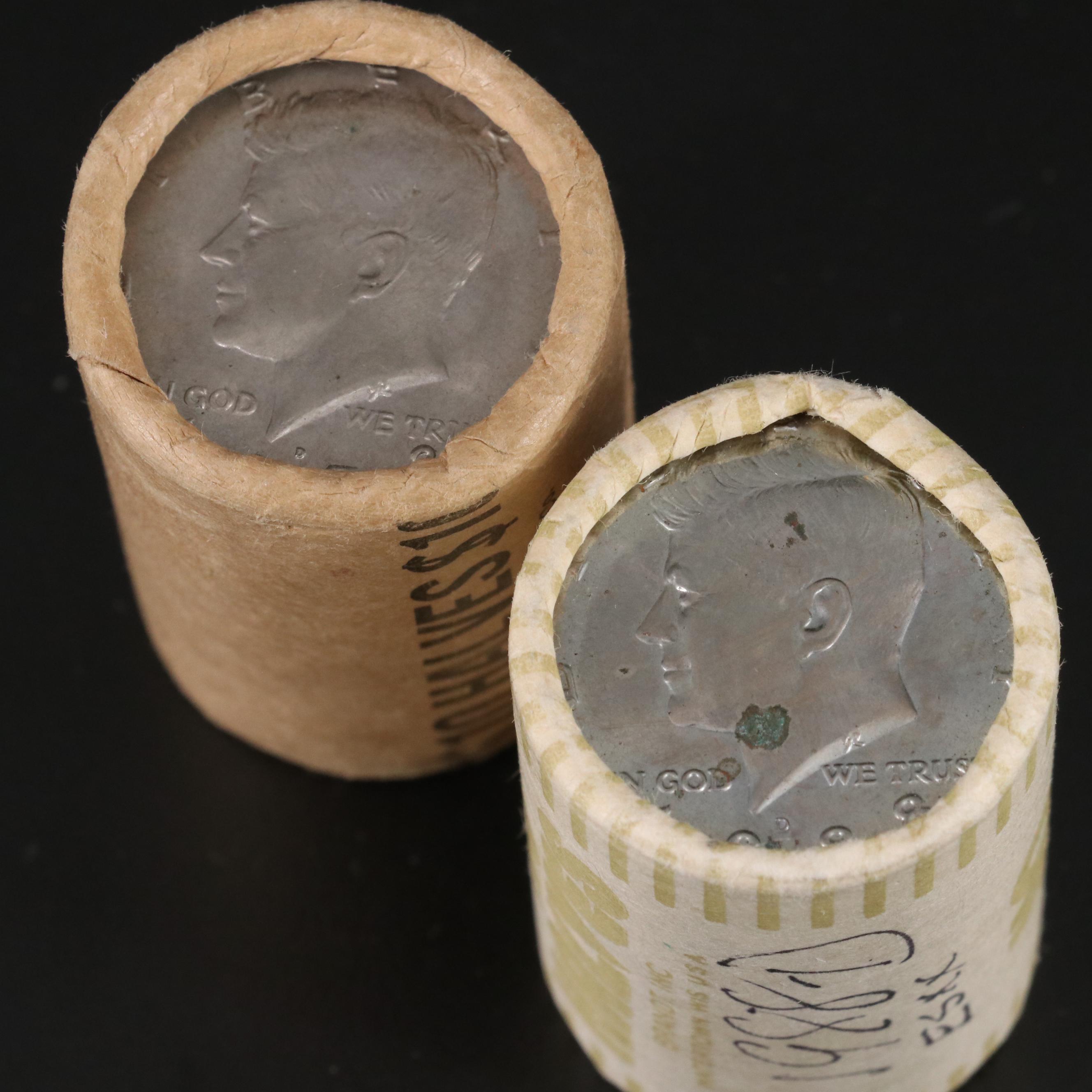 Four Uncirculated Rolls of Kennedy Half Dollars