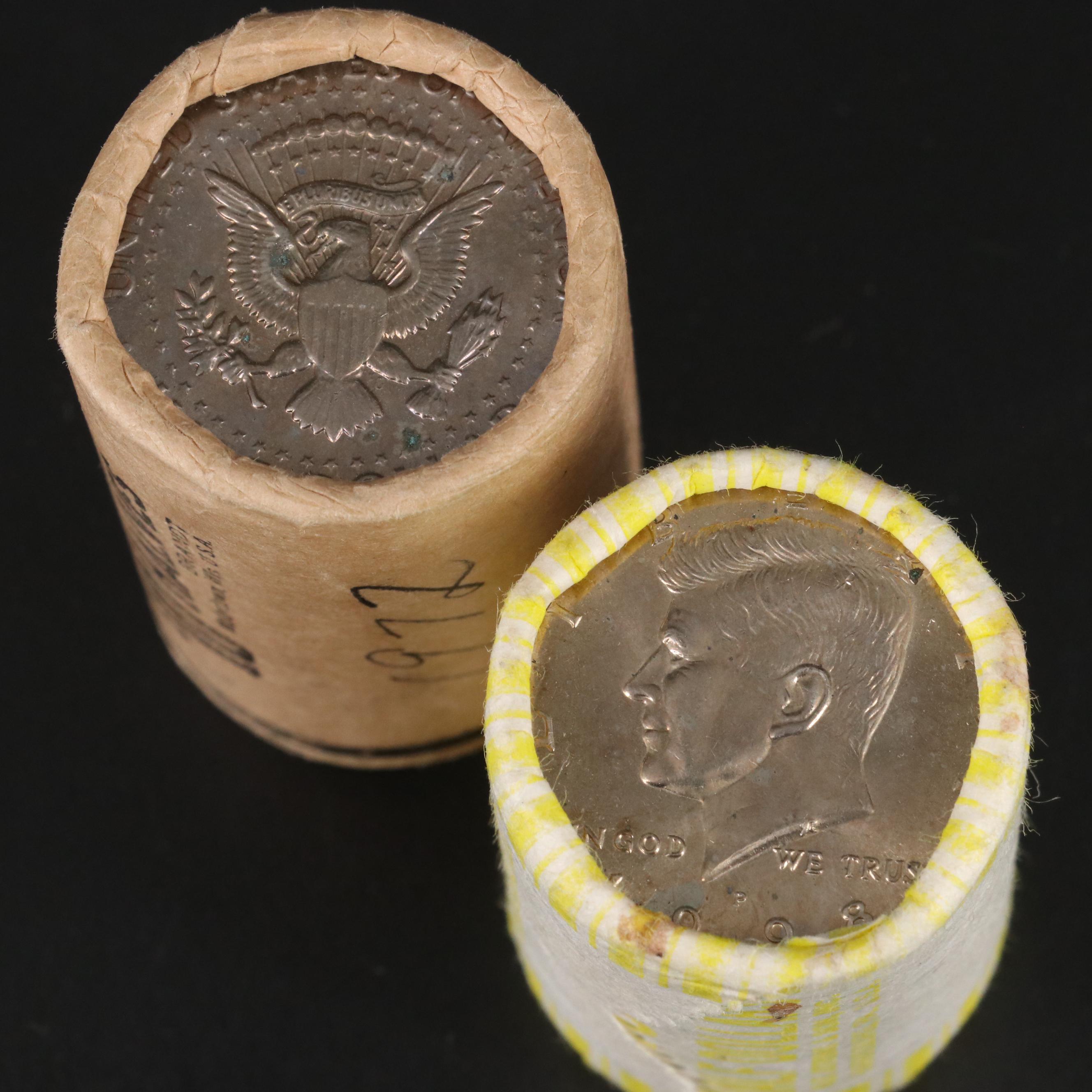 Four Uncirculated Rolls of Kennedy Half Dollars