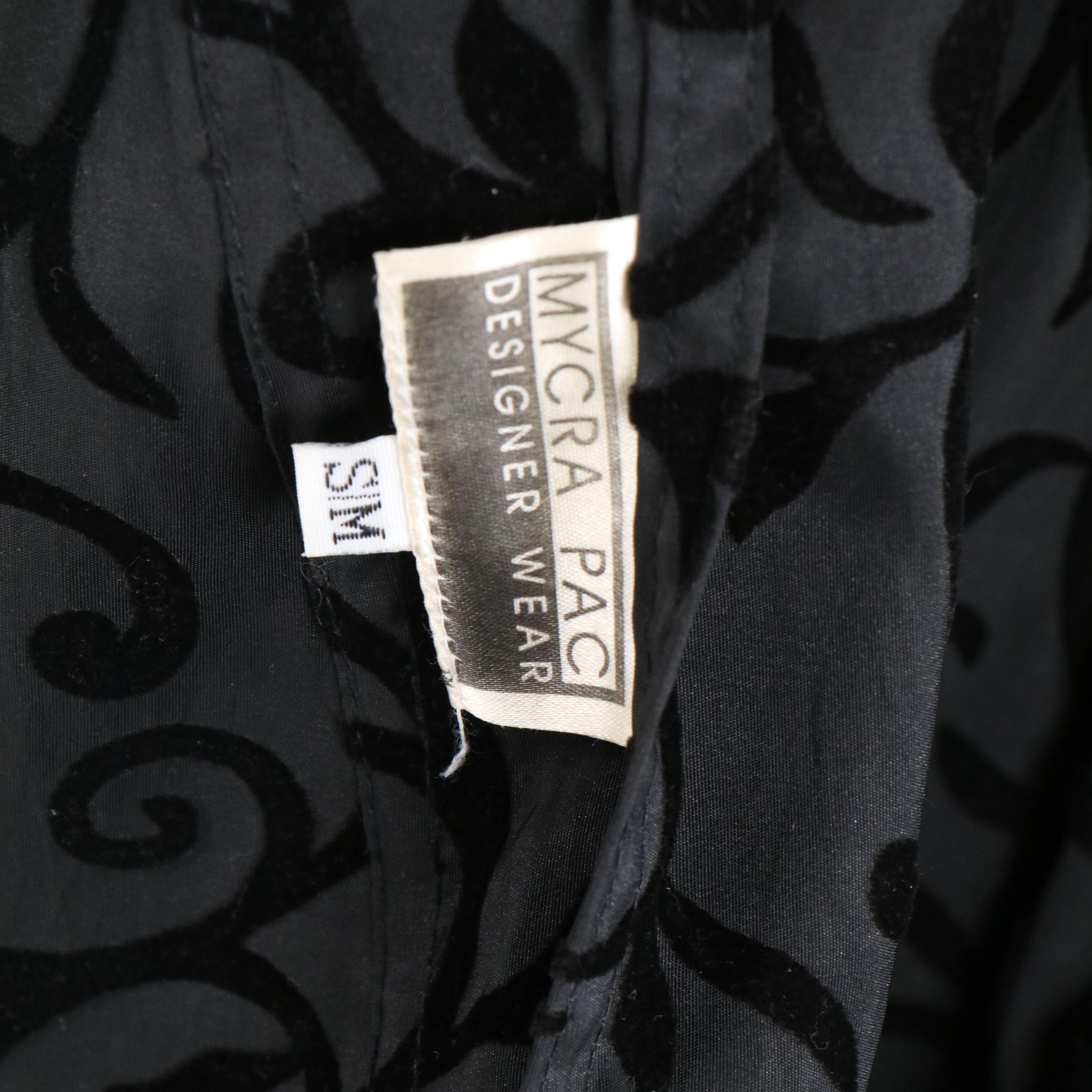 Mycra Pac Reversible Hooded Coat in Black and Black with Scrolling Foliates