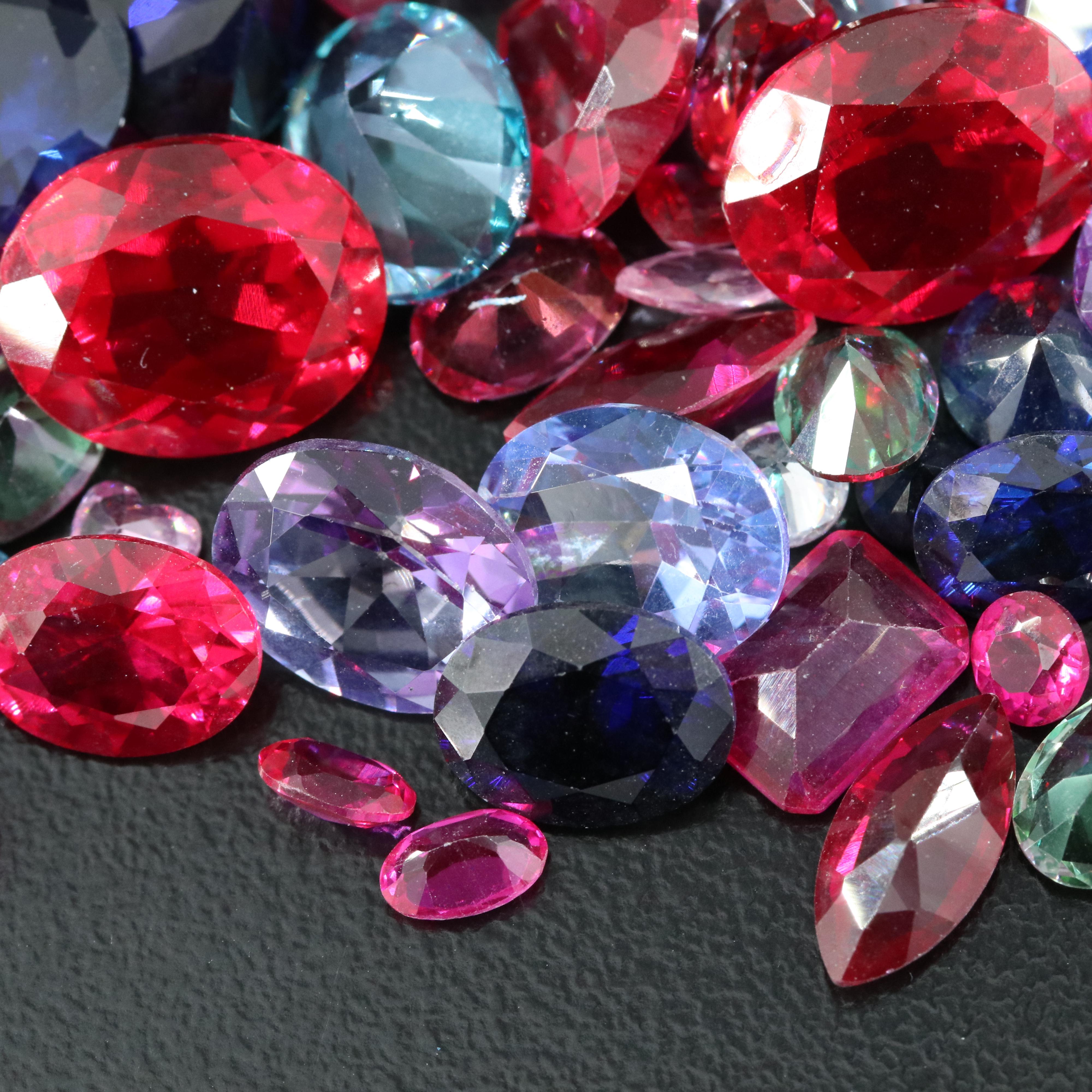 Loose 181.02 CTW Ruby, Sapphire, Topaz, and Gemstone Lot