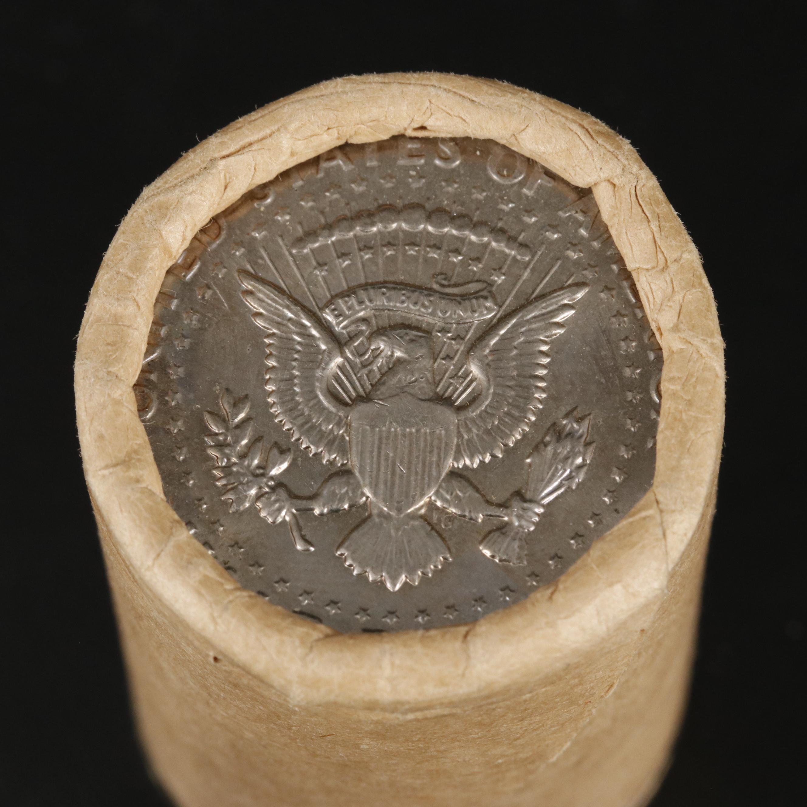 Four Uncirculated Rolls of Kennedy Half Dollars