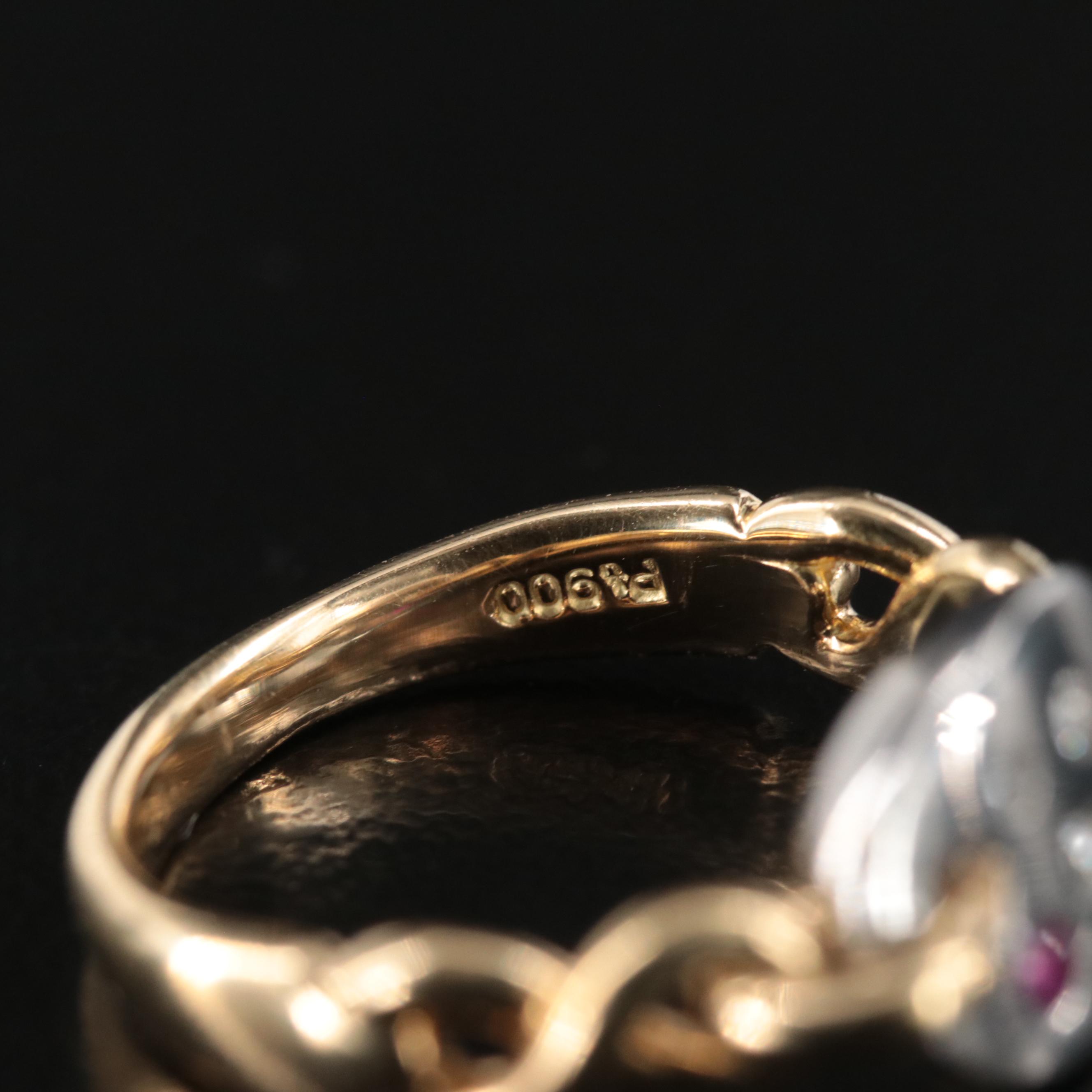 Platinum and 14K Diamond and Ruby Ring with Infinity Shoulders