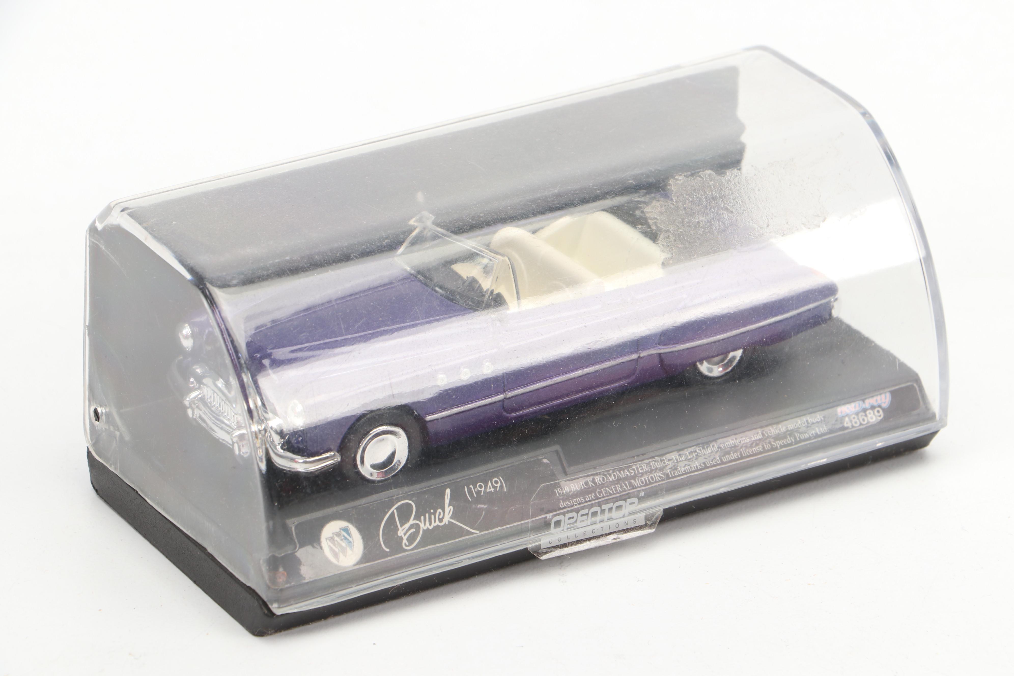 Liberty Classics Ford with Other Diecast Vehicles and Gas Pump