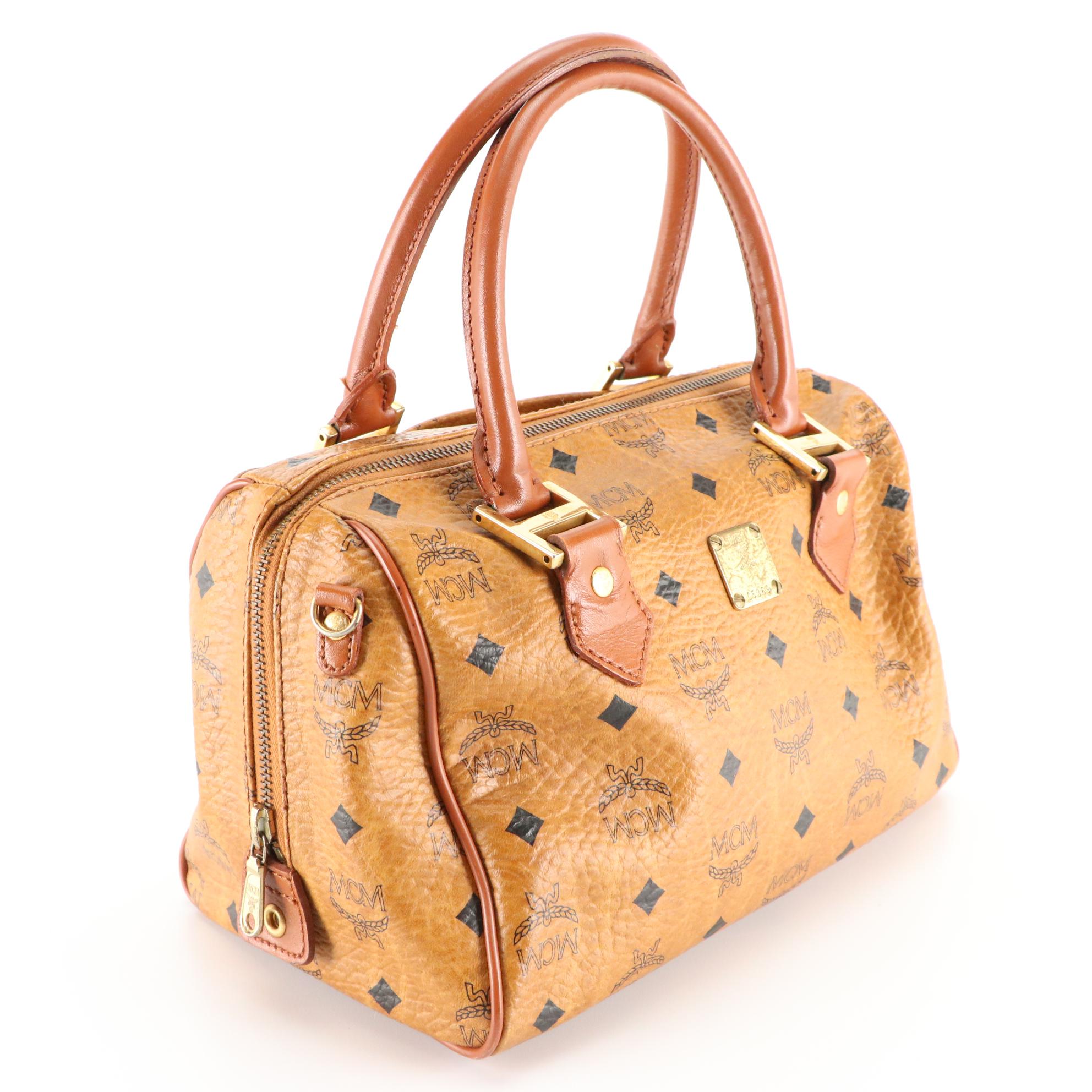 MCM Boston Bag in Visetos Coated Canvas and Cognac Leather Trim