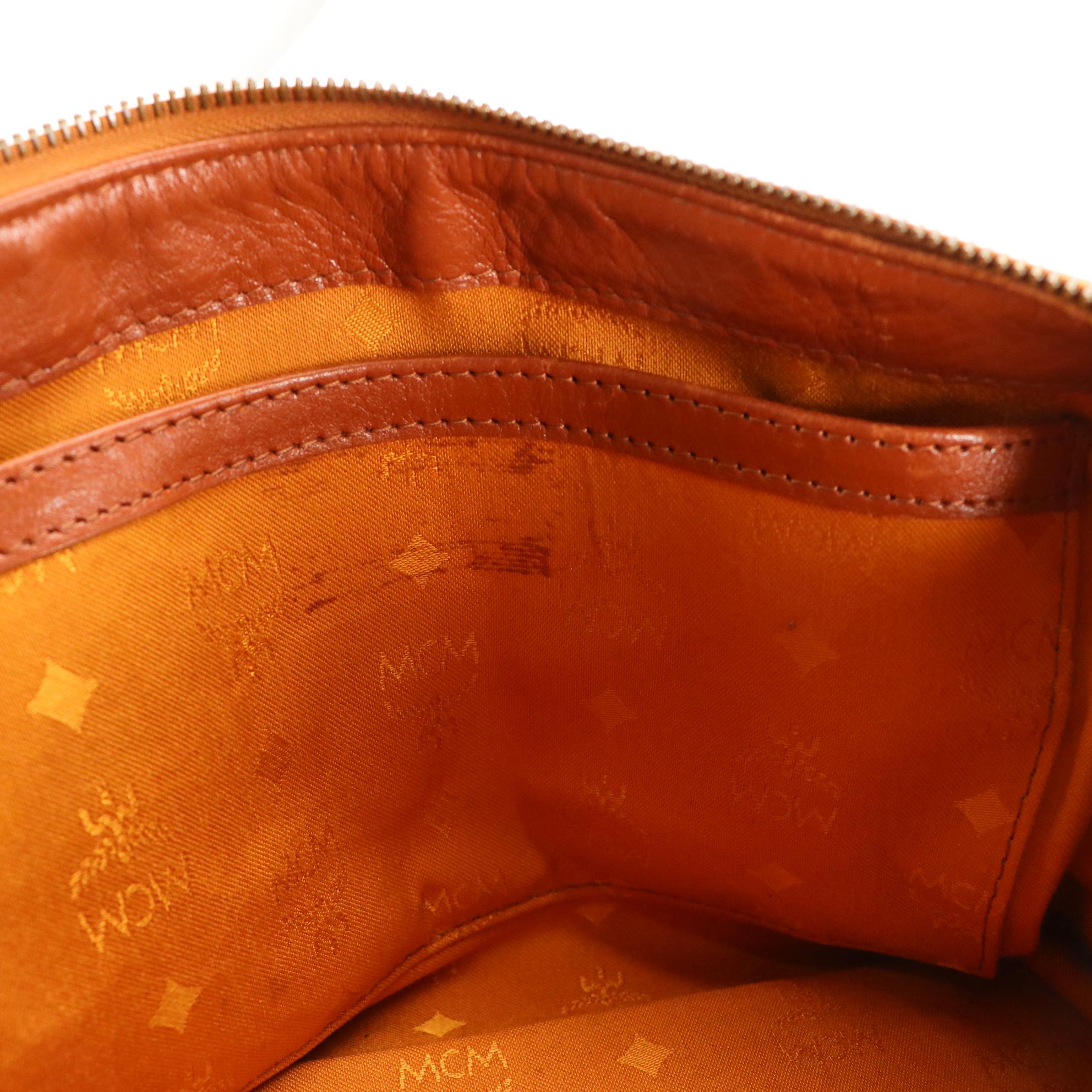 MCM Boston Bag in Visetos Coated Canvas and Cognac Leather Trim