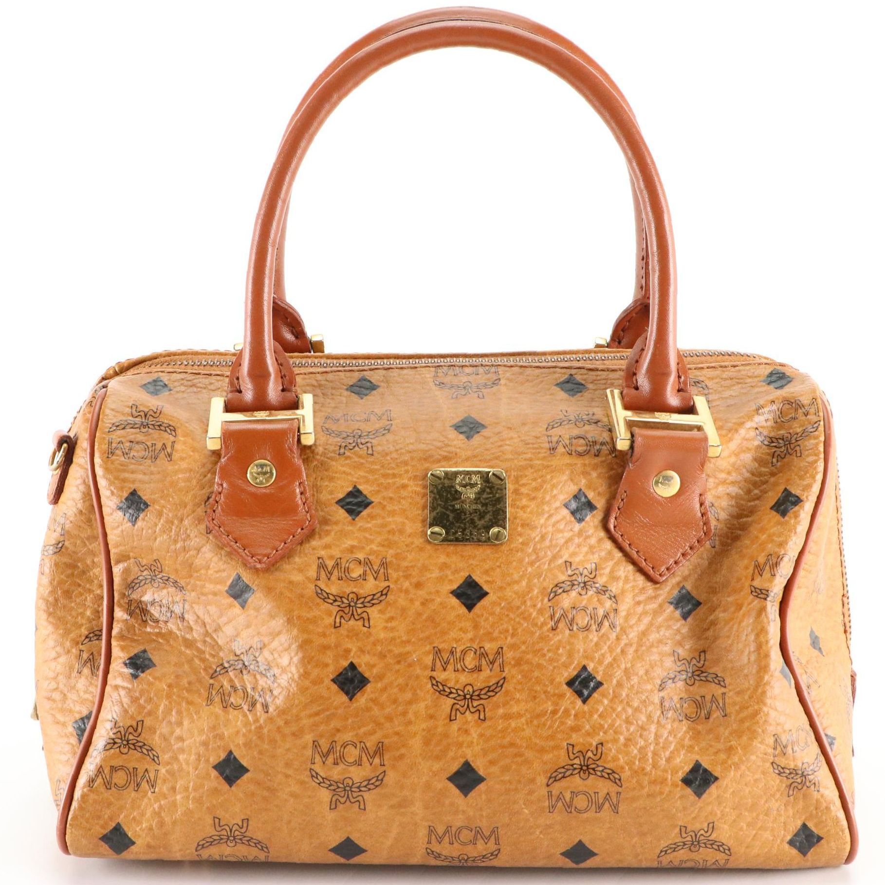 MCM Boston Bag in Visetos Coated Canvas and Cognac Leather Trim