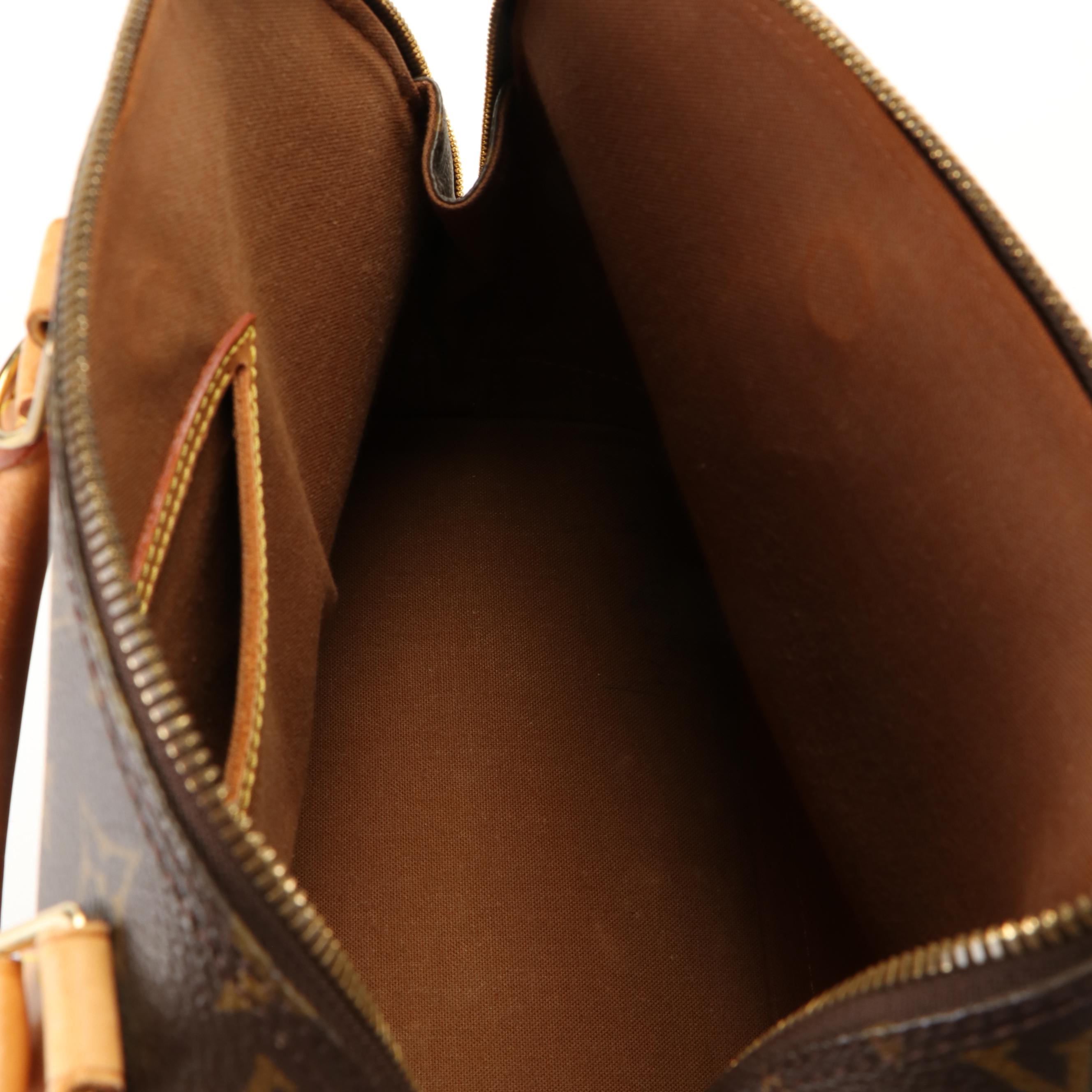 Louis Vuitton Monogram Alma PM Coated Canvas and Leather Top Handle Bag