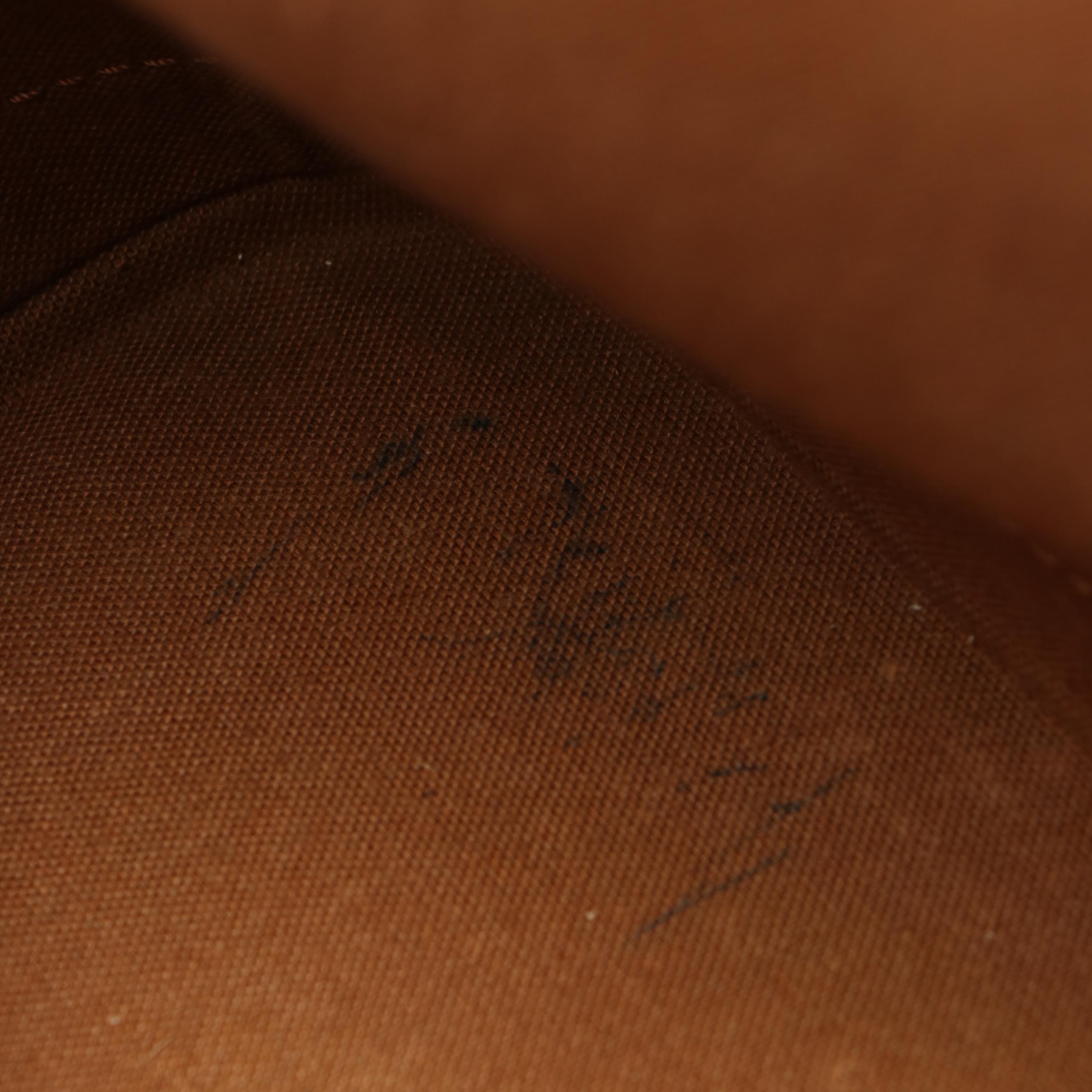 Louis Vuitton Monogram Alma PM Coated Canvas and Leather Top Handle Bag