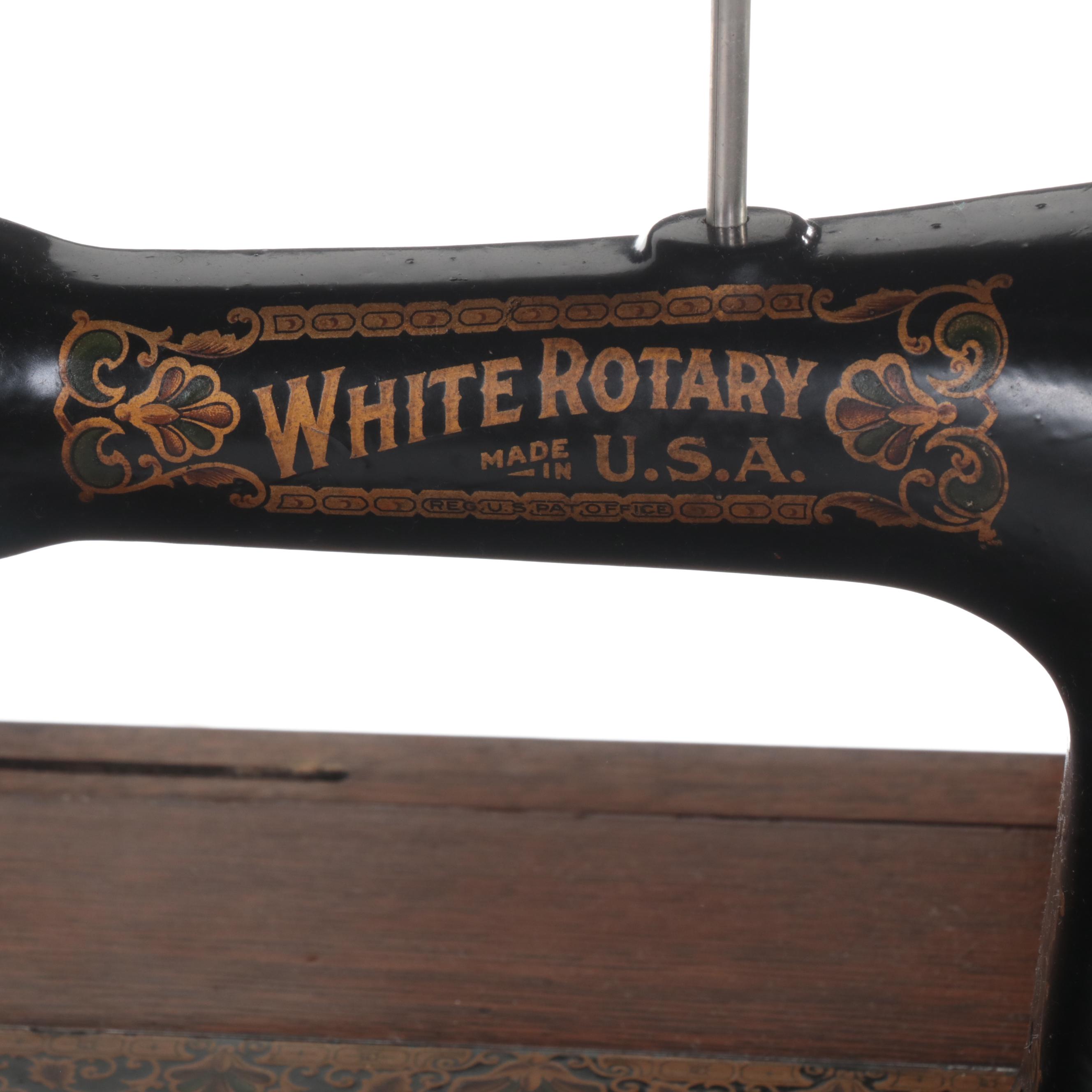 Late Victorian White Rotary Treadle Sewing Machine with Oak and Iron Cabinet