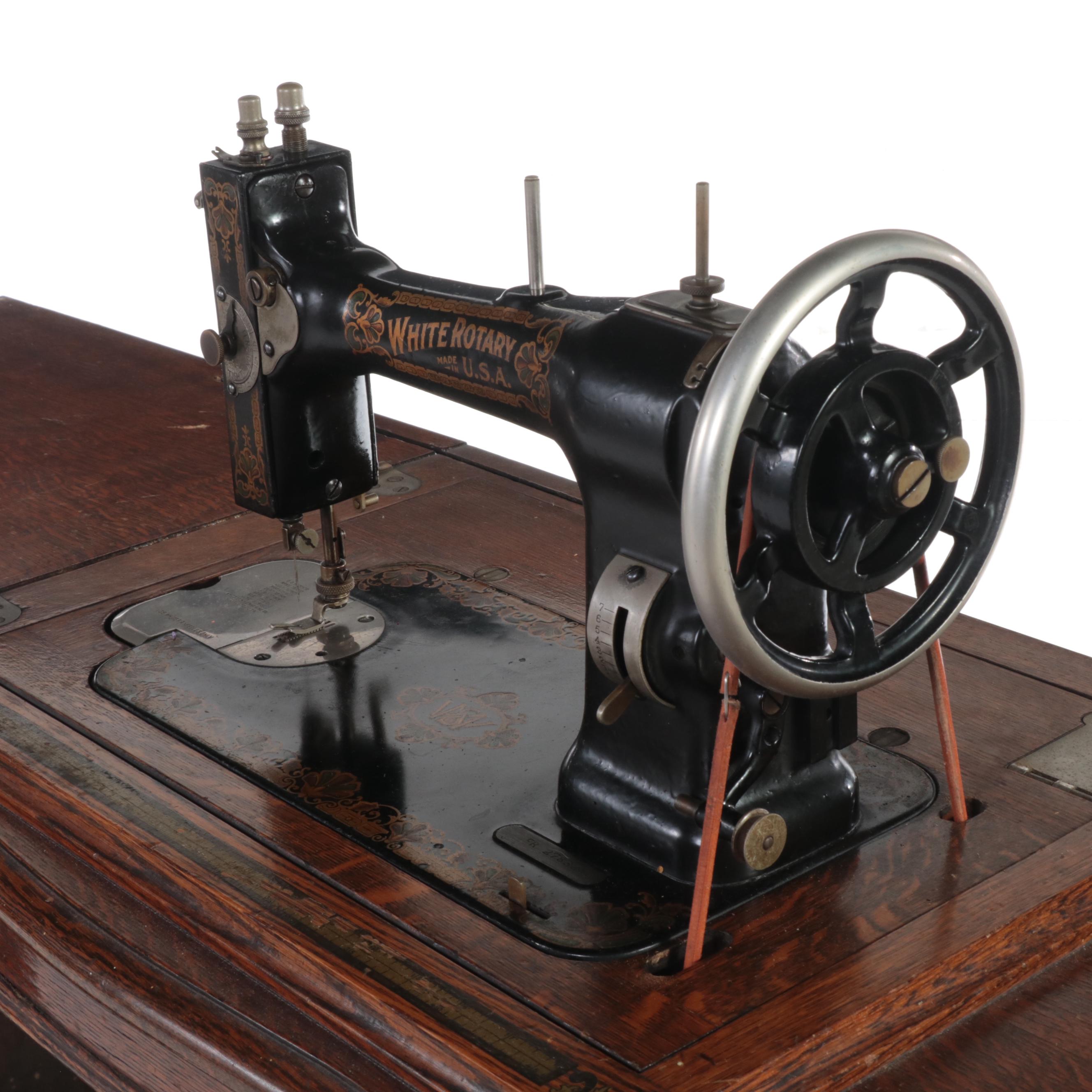 Late Victorian White Rotary Treadle Sewing Machine with Oak and Iron Cabinet