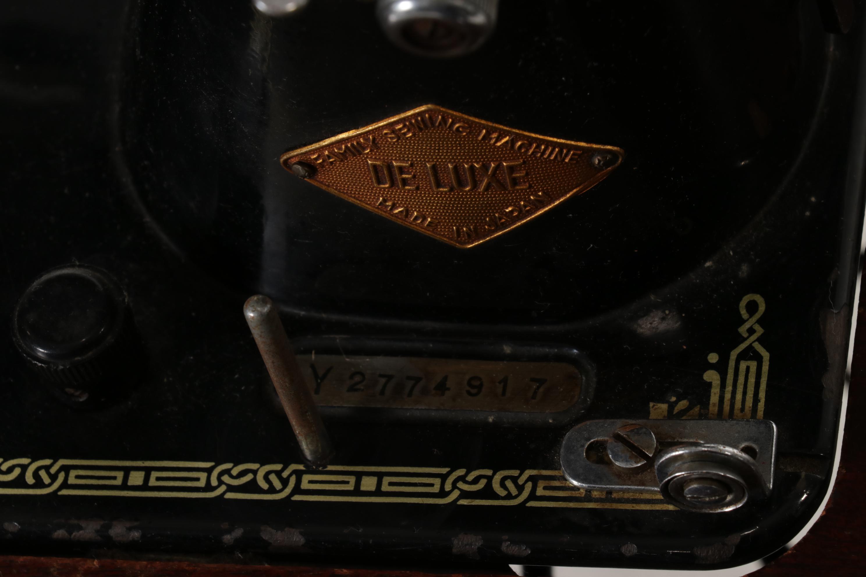 Dressmaker Special "De Luxe" Sewing Machine in Mahogany Cabinet