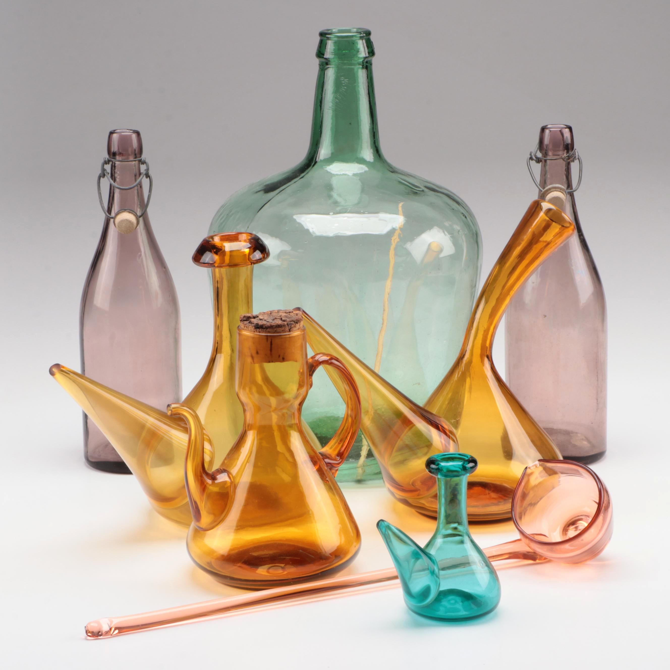 Spanish Amber Glass Porrons with Other Bottles and Ladle