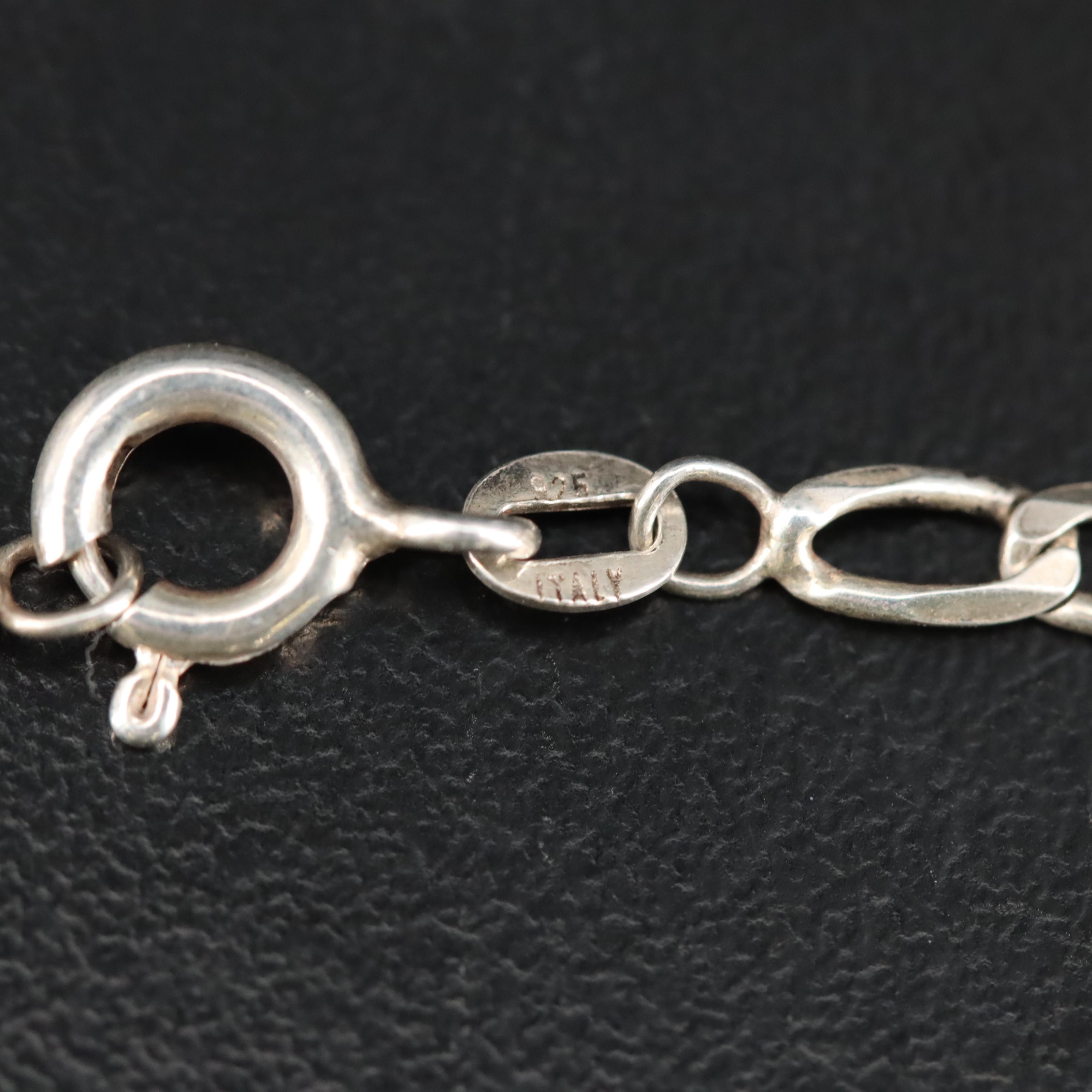 Robert Lee Morris Studio Disc Pendant and Artisan Featured in Sterling Jewelry