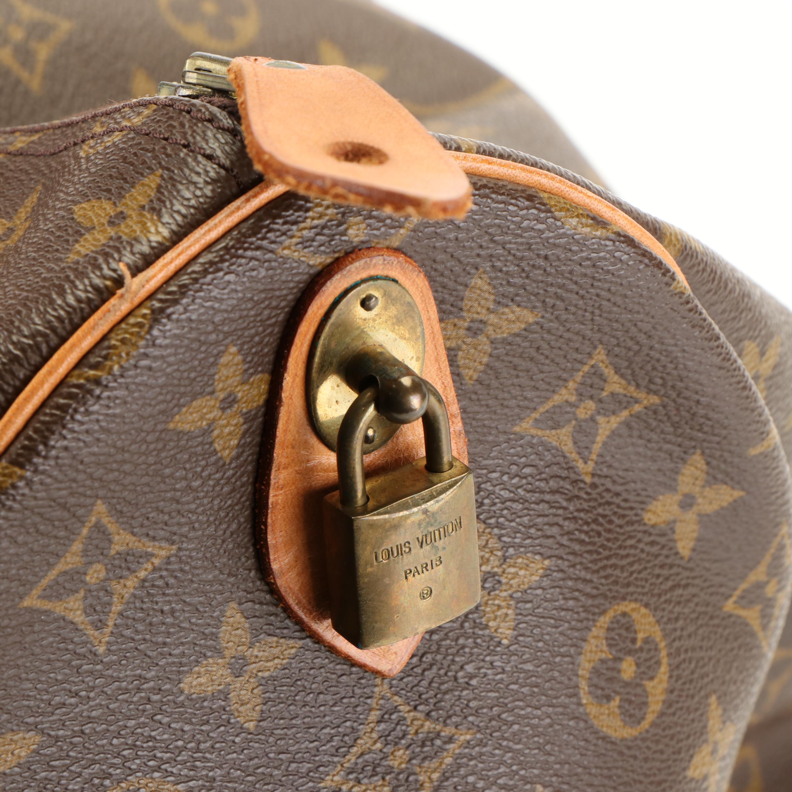Louis Vuitton Keepall 60 Monogram Canvas and Leather Duffle Bag