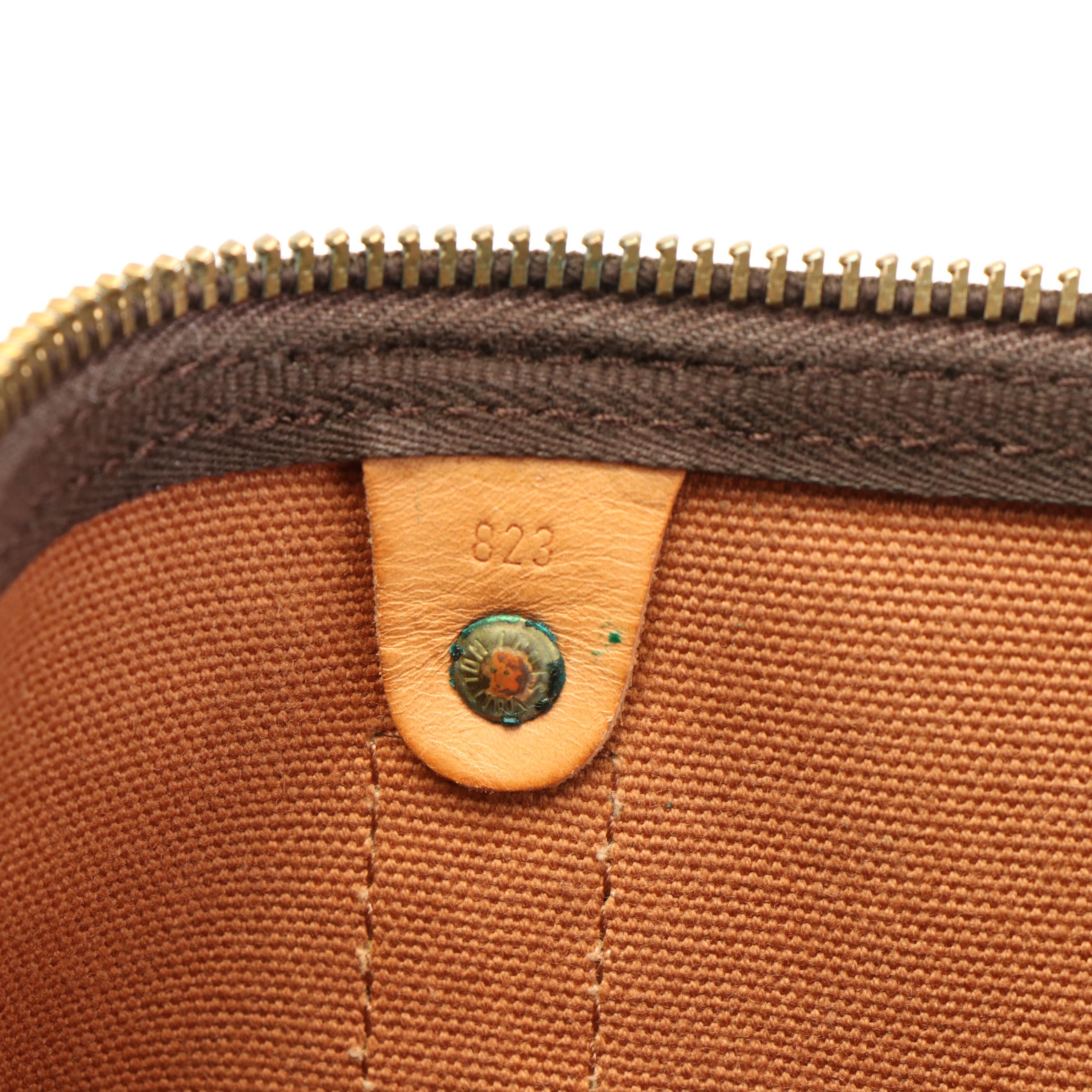 Louis Vuitton Keepall 60 Monogram Canvas and Leather Duffle Bag