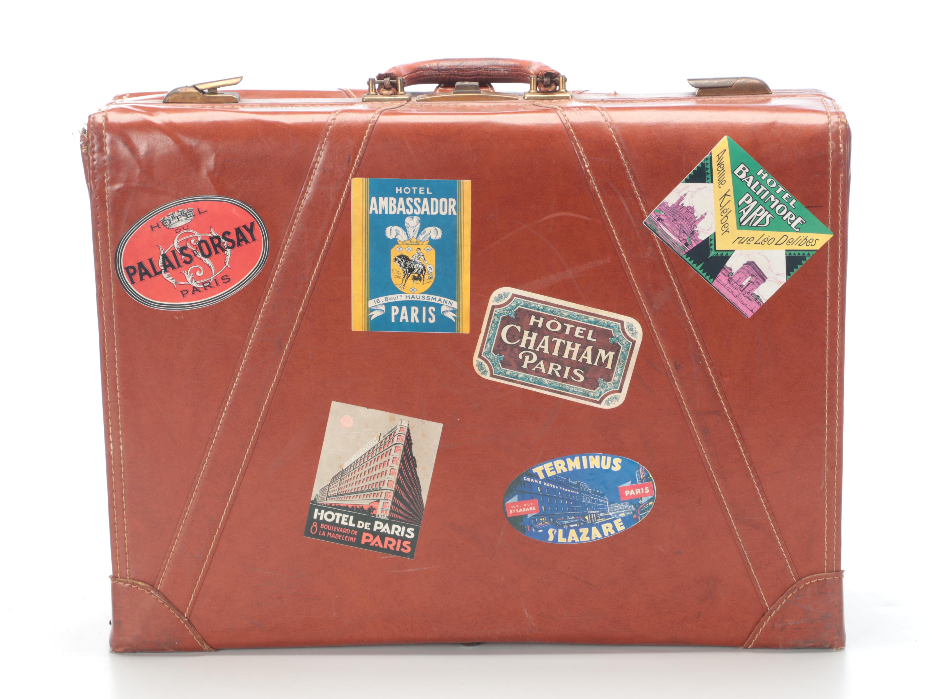 Vintage Leather-Covered Suitcase with International Travel Stickers