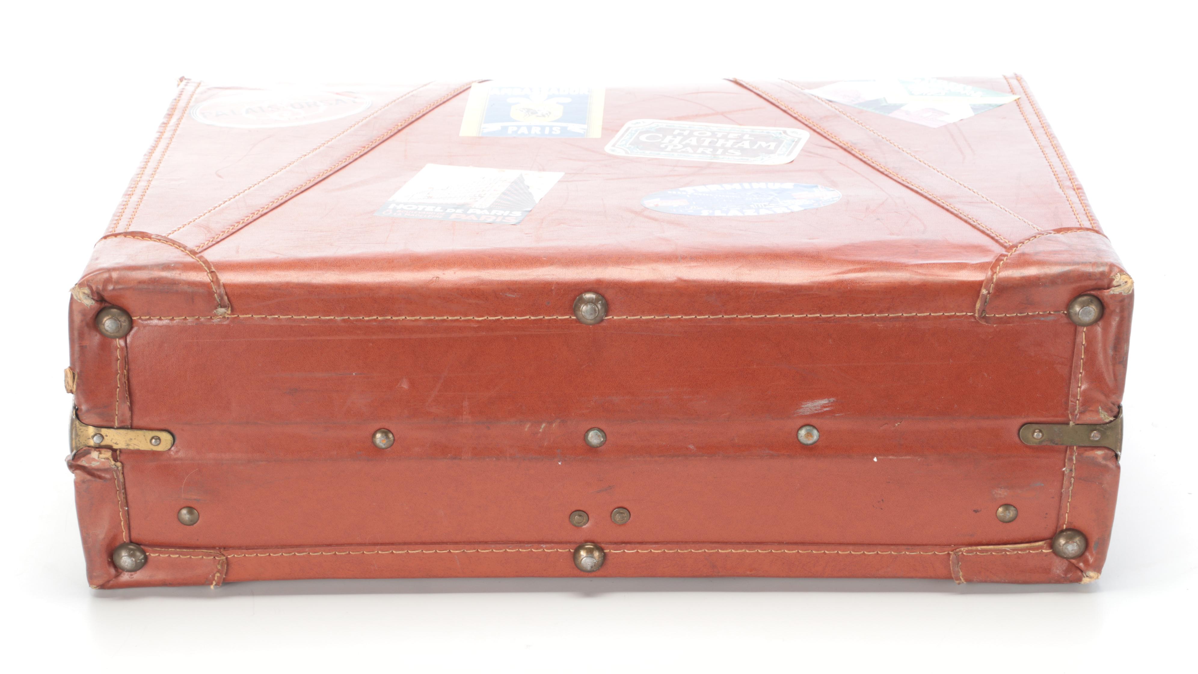 Vintage Leather-Covered Suitcase with International Travel Stickers
