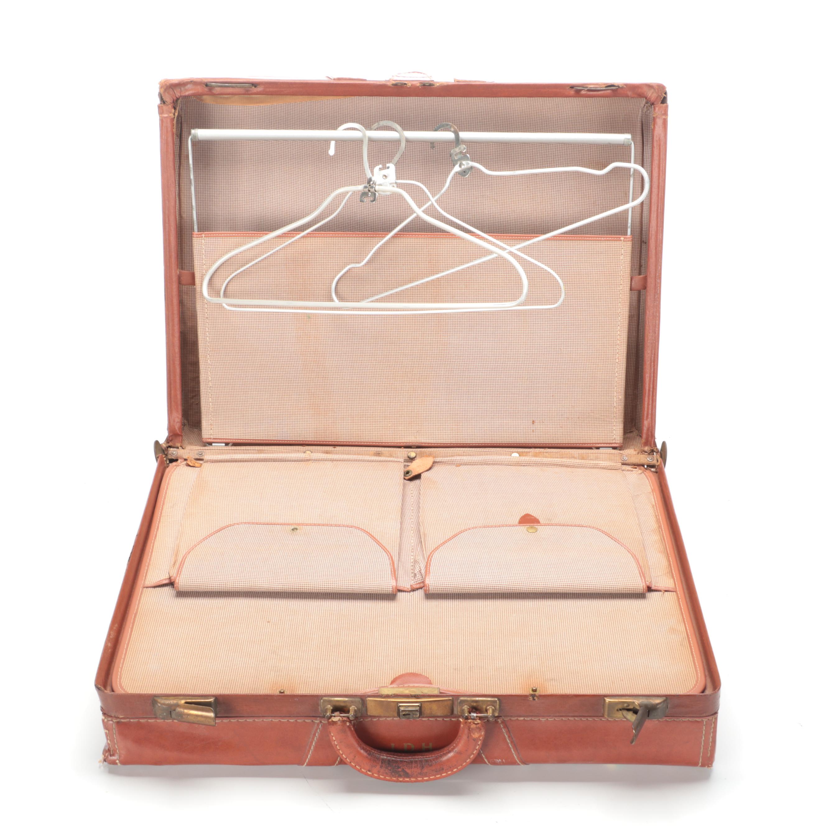 Vintage Leather-Covered Suitcase with International Travel Stickers