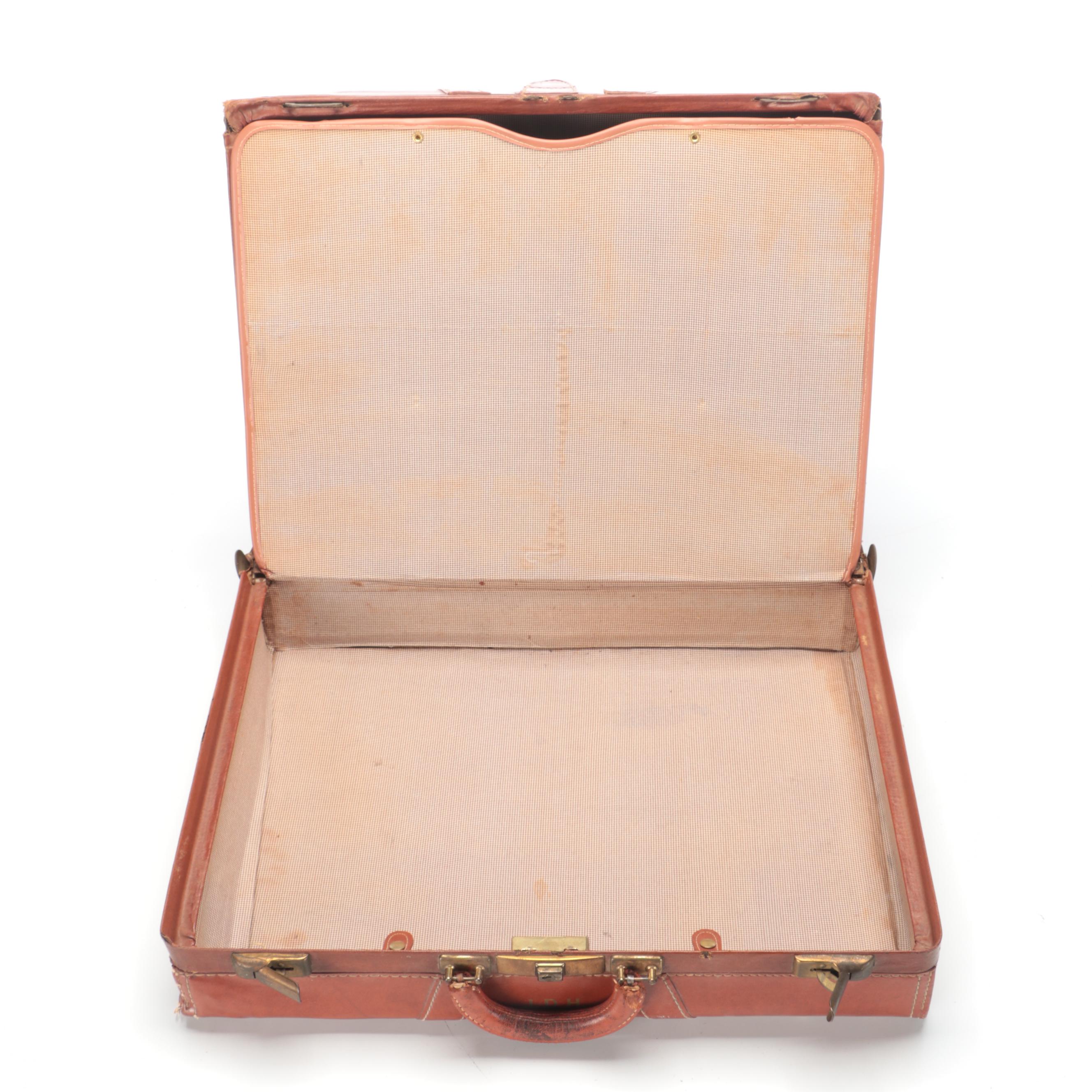 Vintage Leather-Covered Suitcase with International Travel Stickers