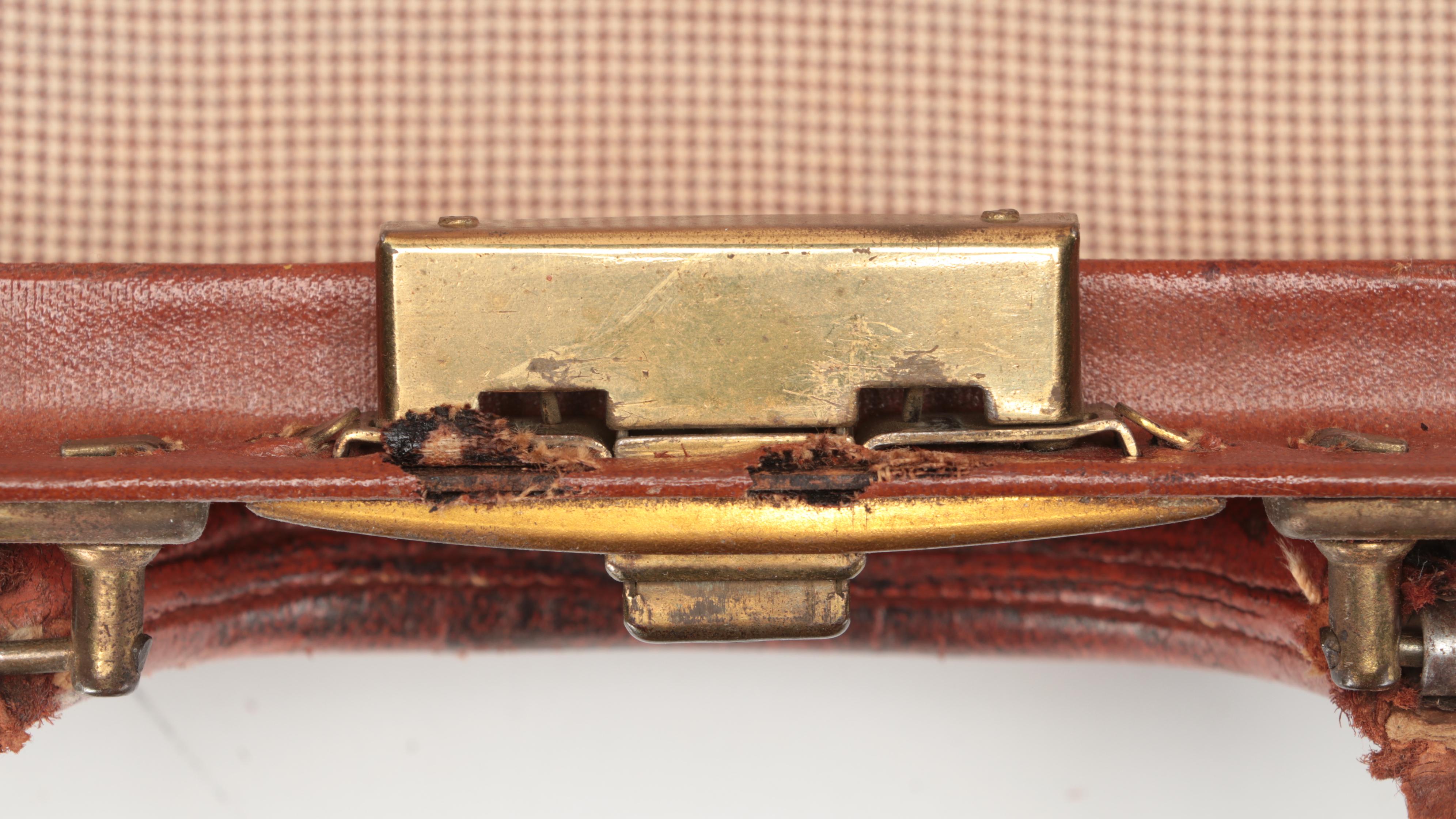 Vintage Leather-Covered Suitcase with International Travel Stickers