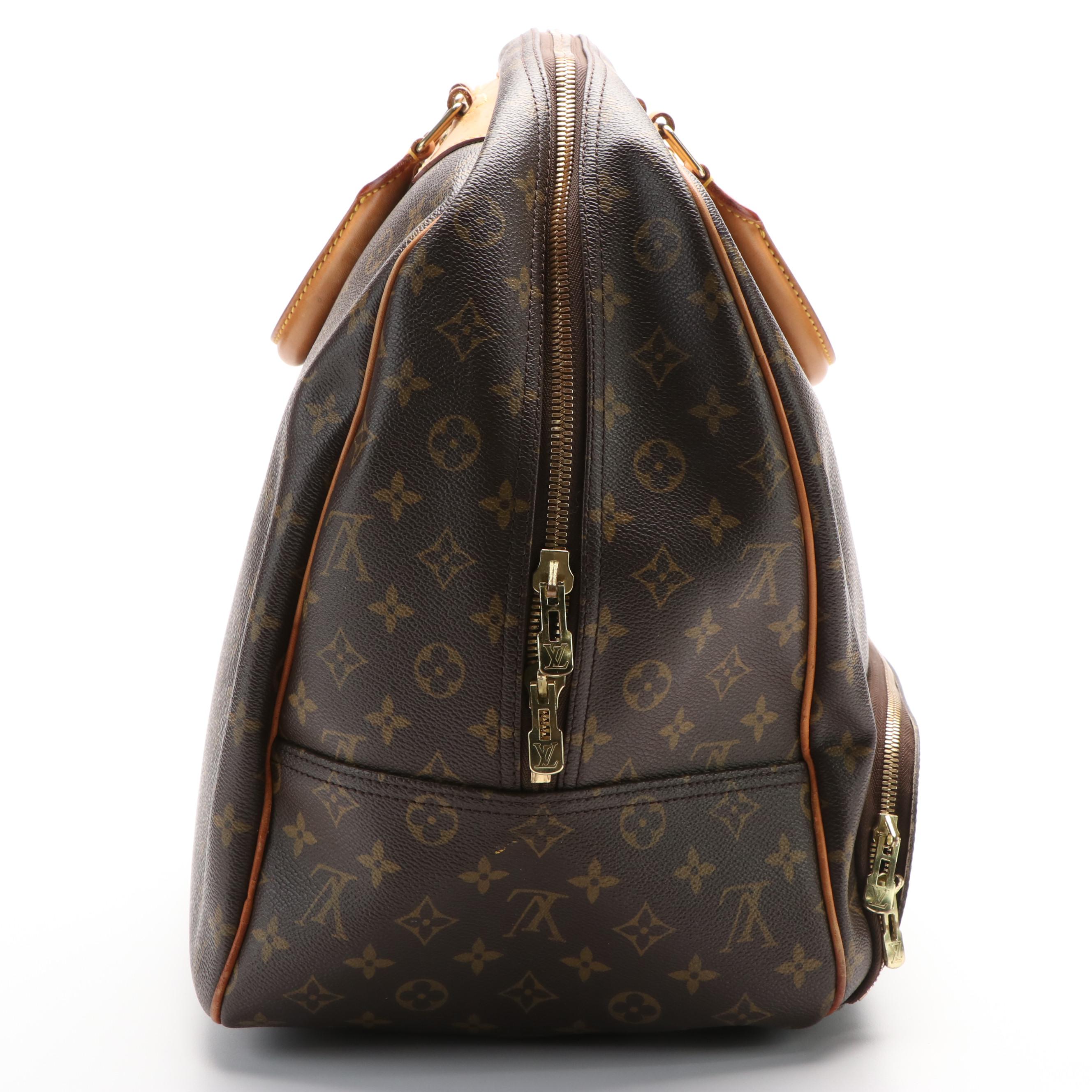 Louis Vuitton Evasion Travel Bag in Monogram Coated Canvas