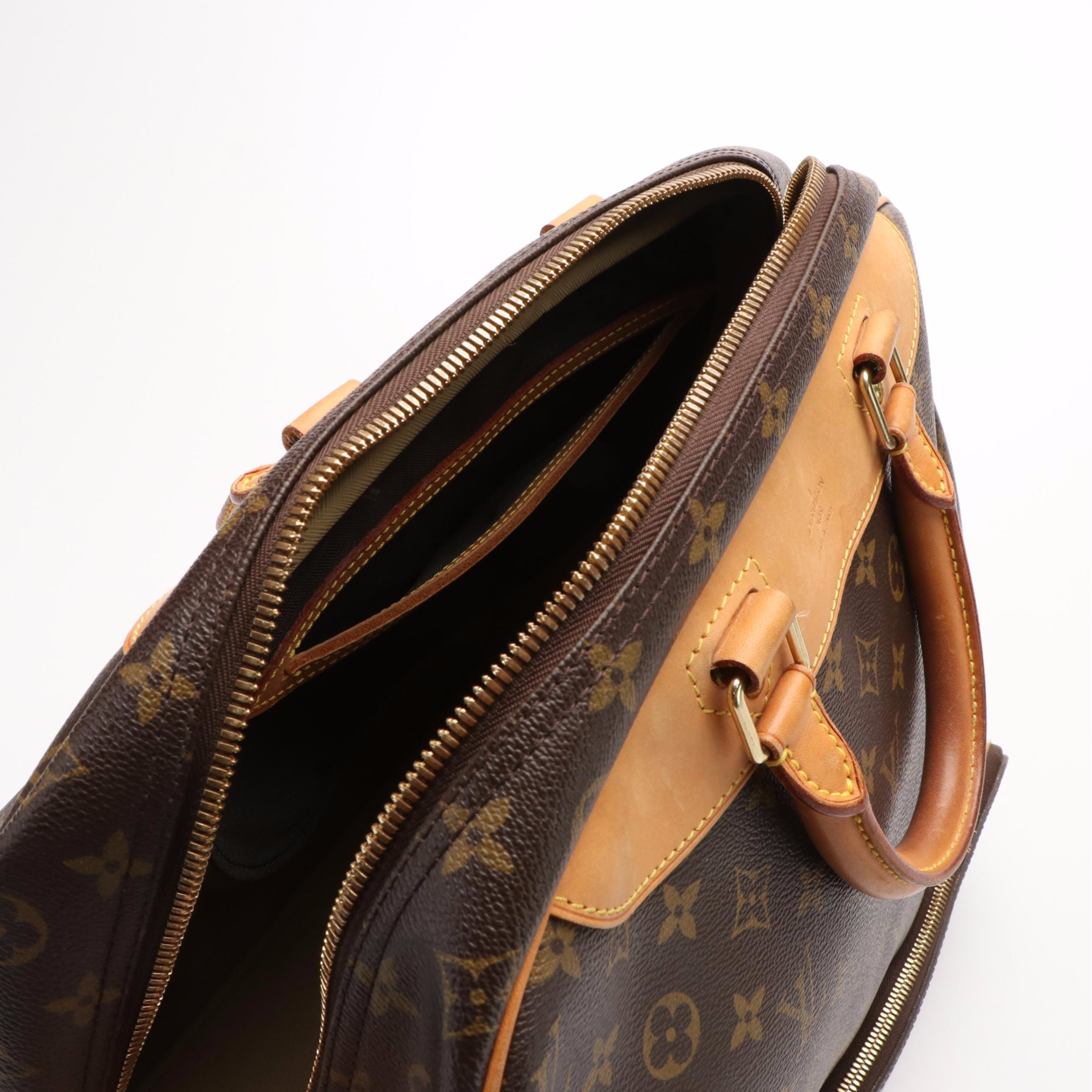 Louis Vuitton Evasion Travel Bag in Monogram Coated Canvas