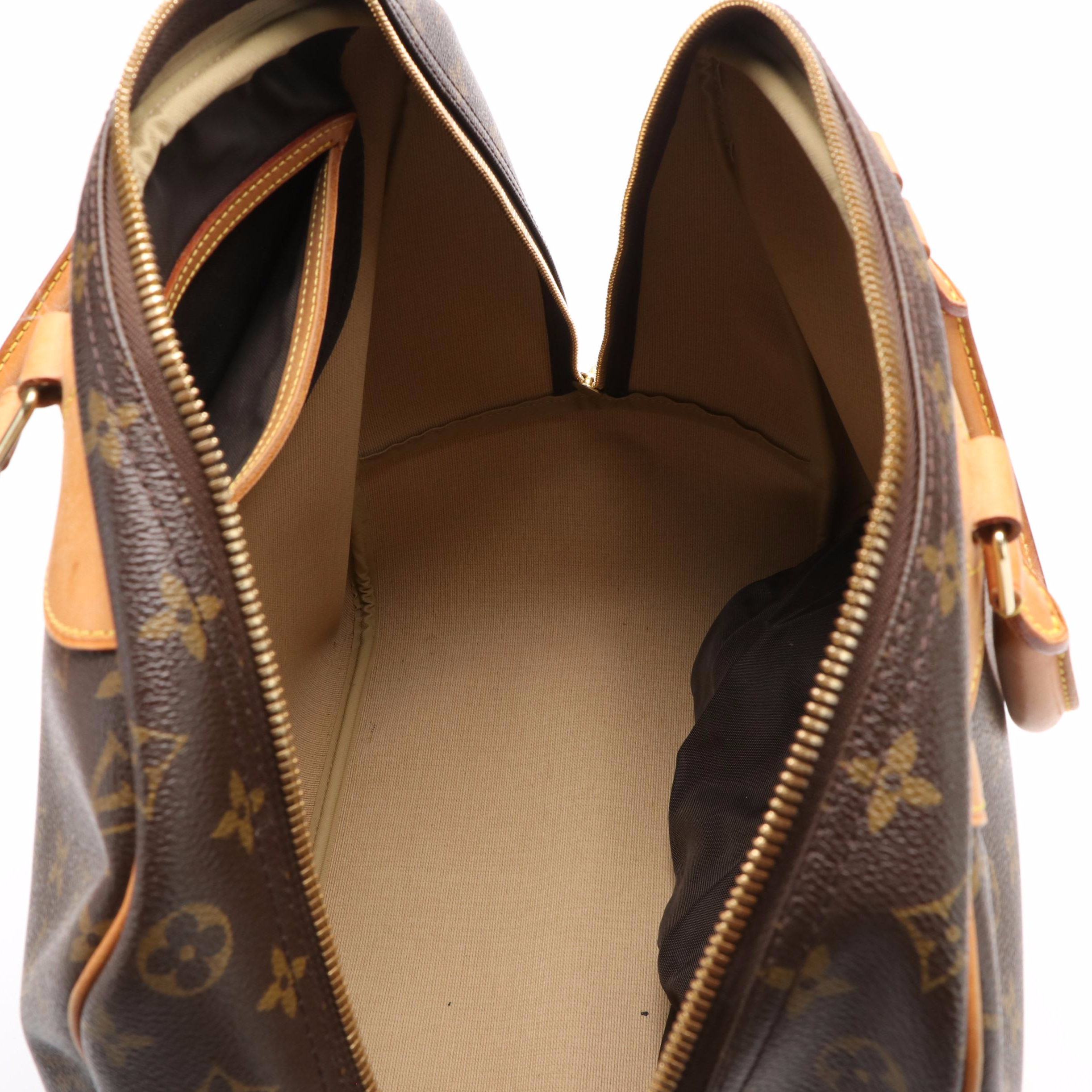 Louis Vuitton Evasion Travel Bag in Monogram Coated Canvas