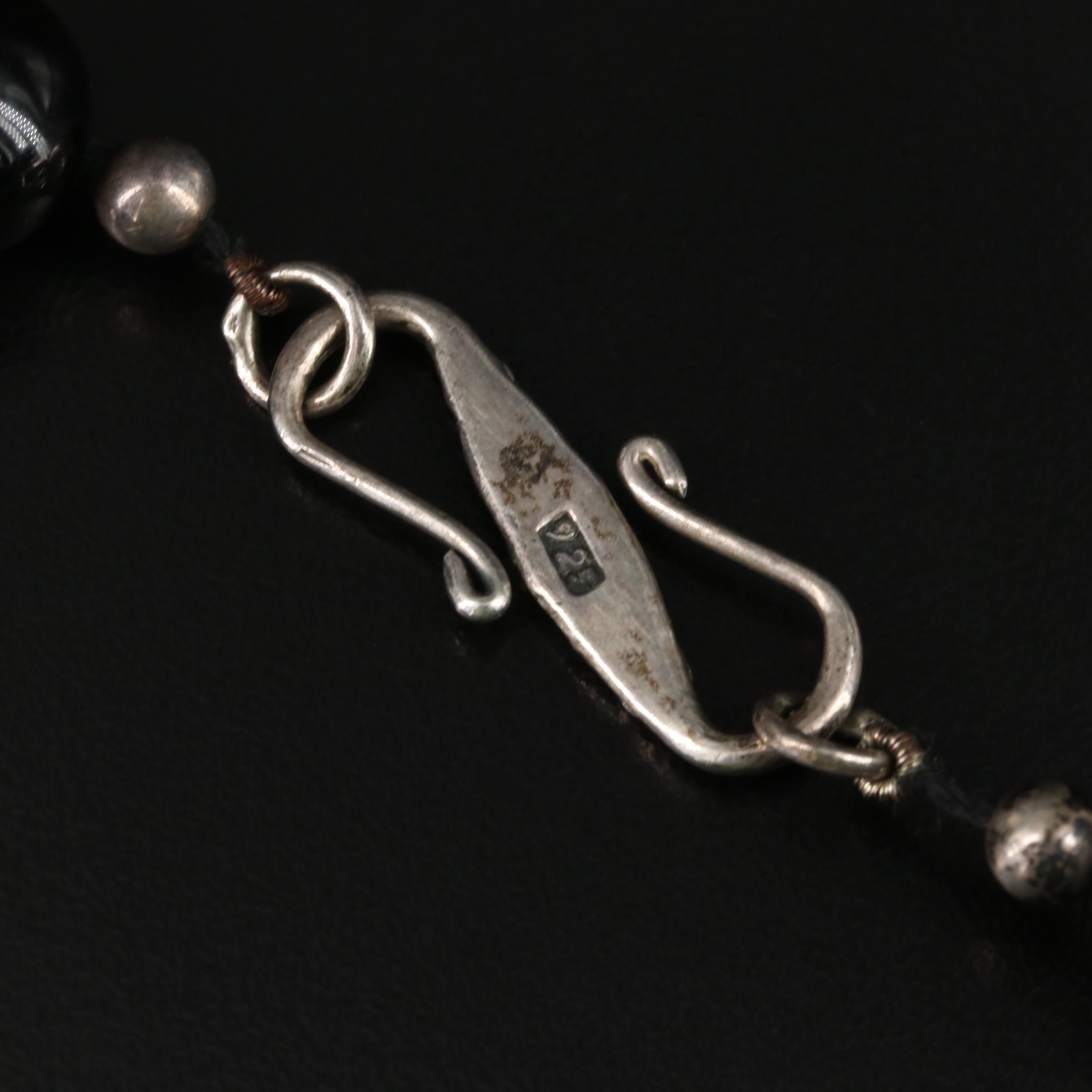 Sterling, Quartz, Bone and Snowflake Obsidian Featured in Necklace Collection