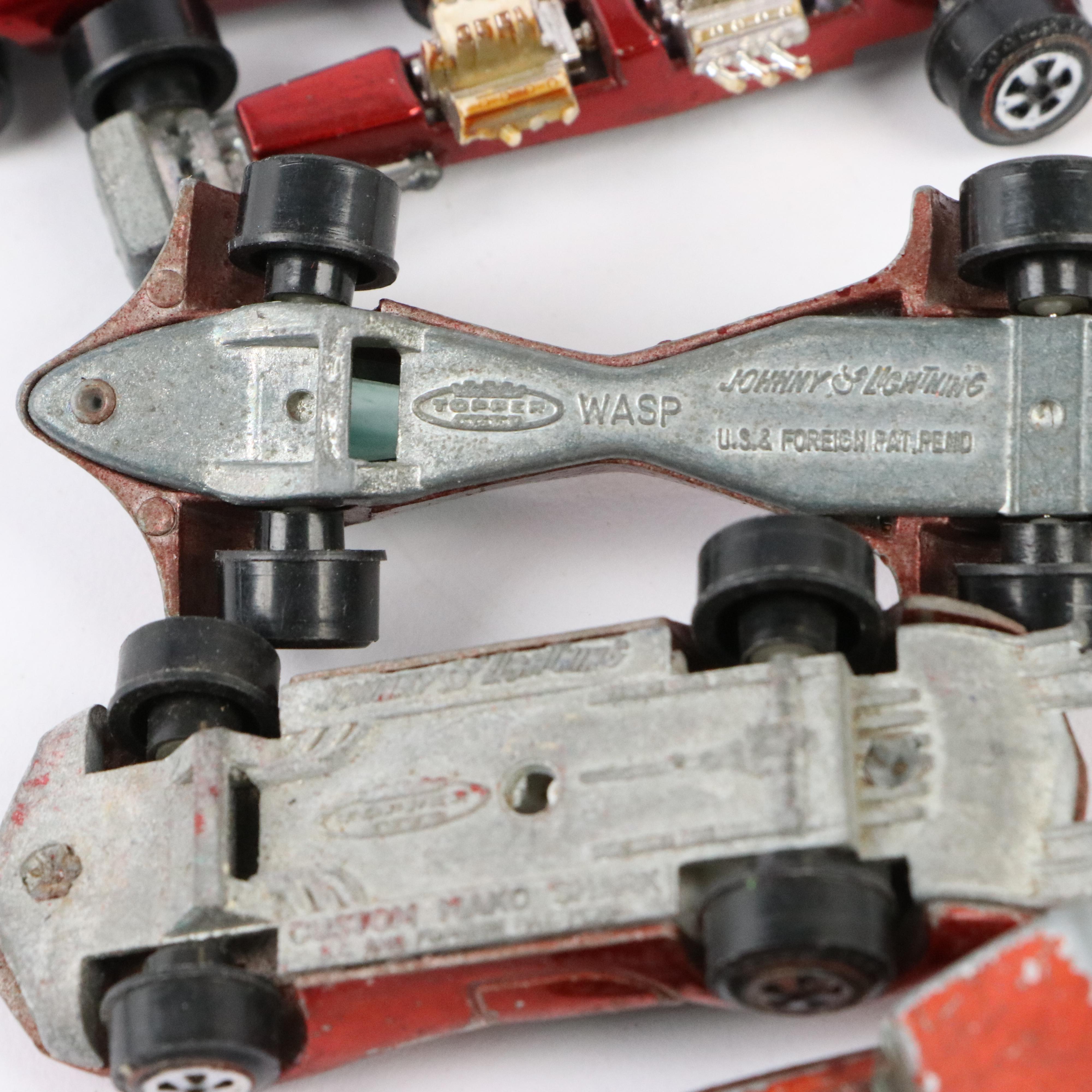 Johnny Lightning Diecast Cars Including Gold "Wasp", "Monster", "Vicious Vette"